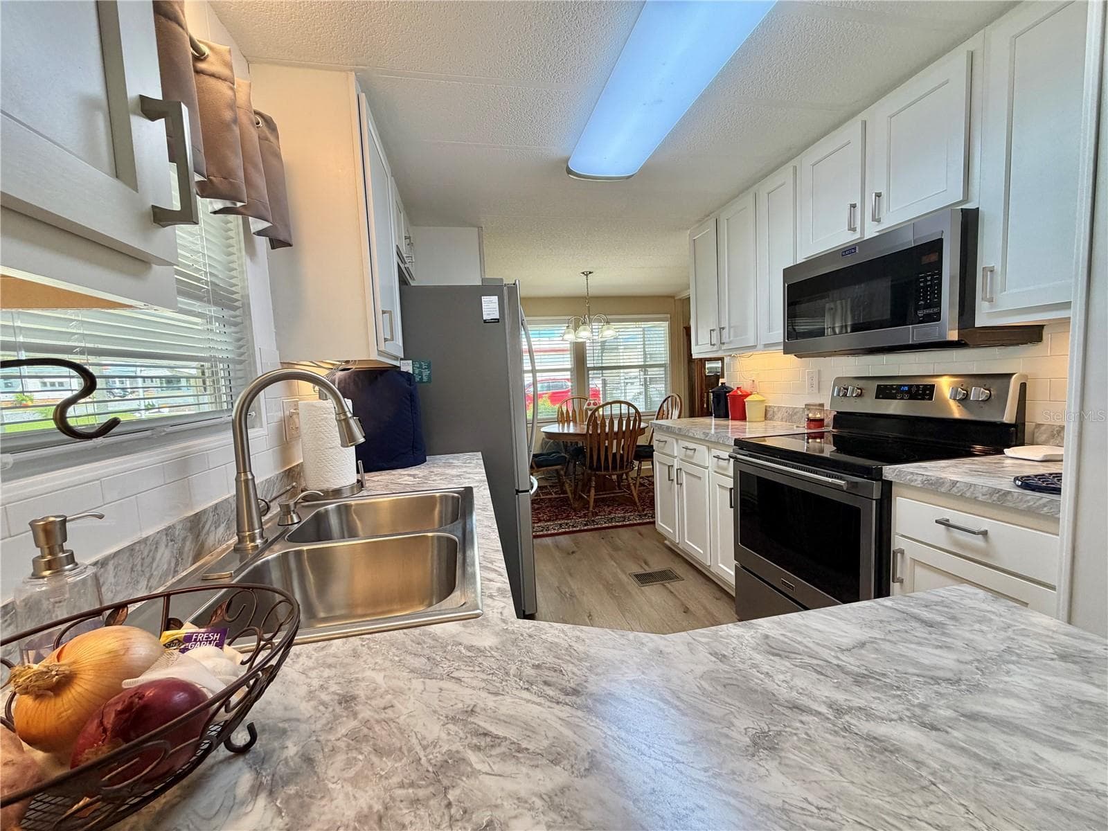 Mobile Home at 131 BOUGAINVILLEA DR, LEESBURG, photo 5 of 68