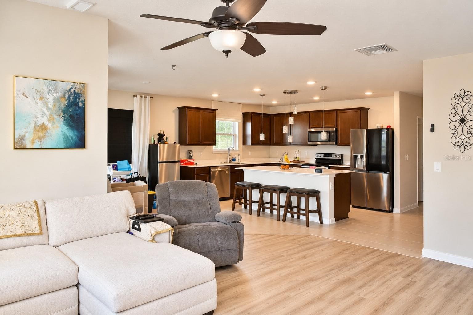Open Living and Kitchen Layout - 30390 CARAVELLE LN, WESLEY CHAPEL