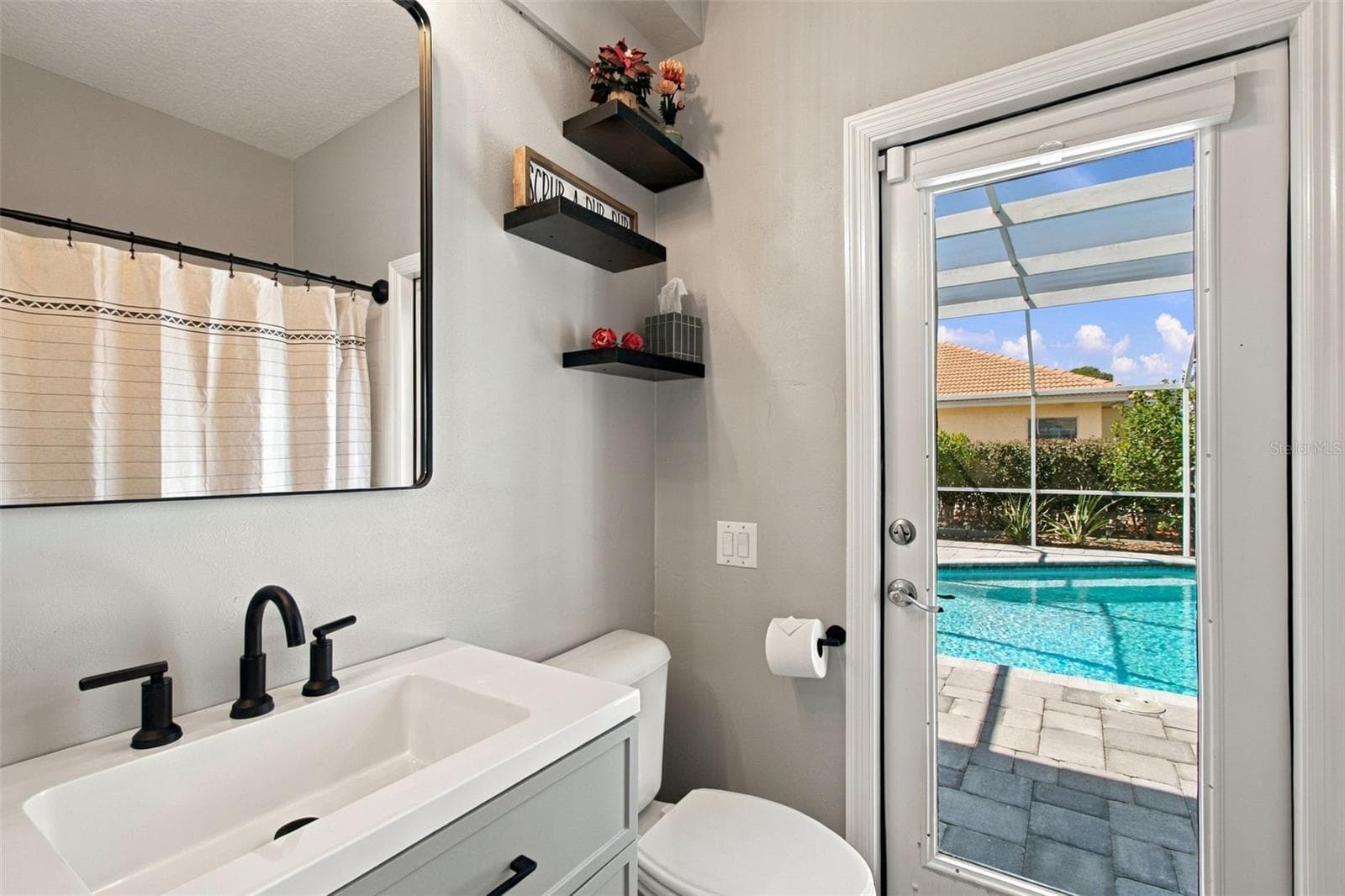 Pool bath attached to bedroom 2 - 5406 E LONGBOAT, TAMPA
