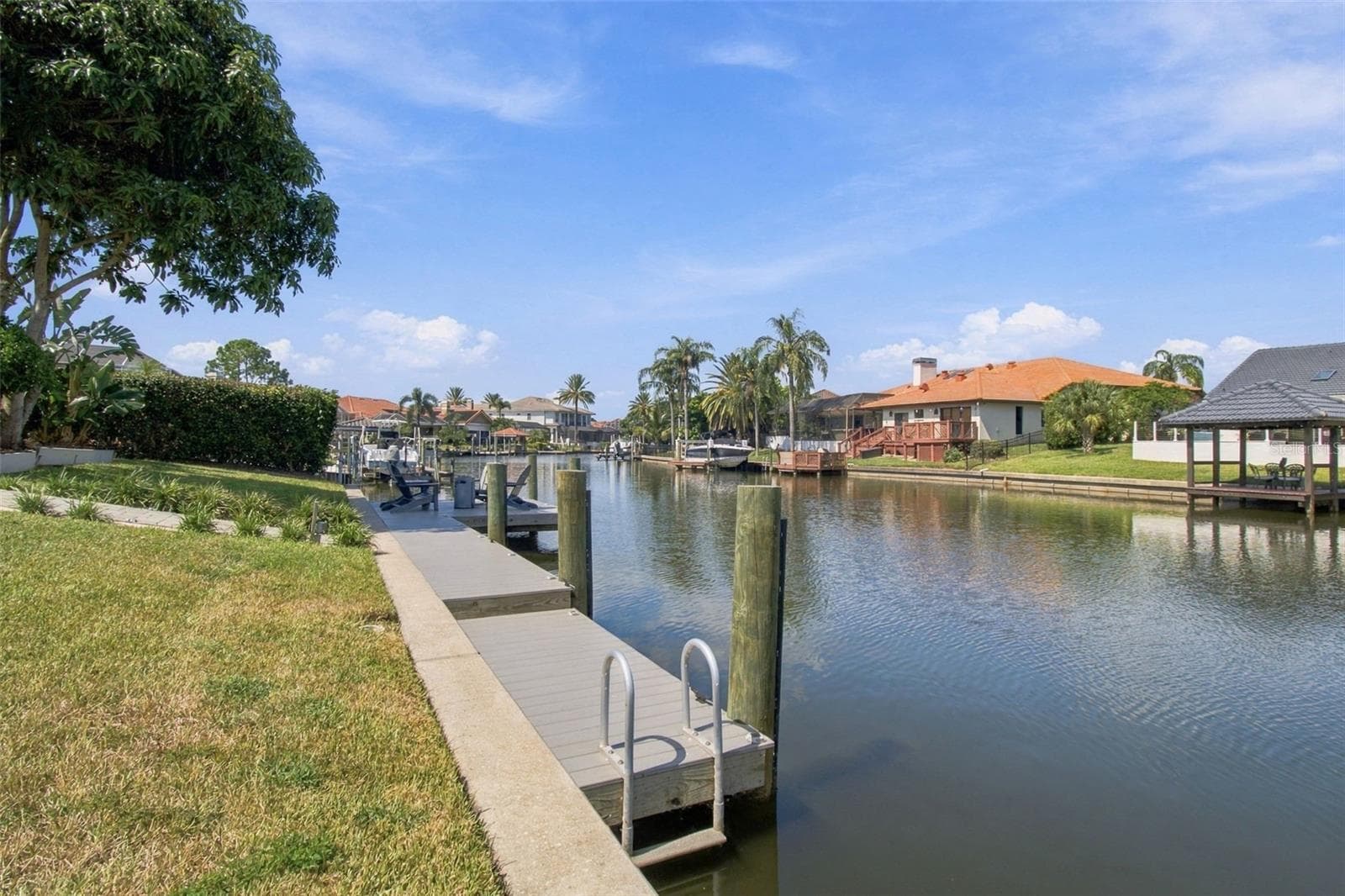 a two-level design for easy access to paddleboarding, kayaking, and other water activities - 5406 E LONGBOAT, TAMPA