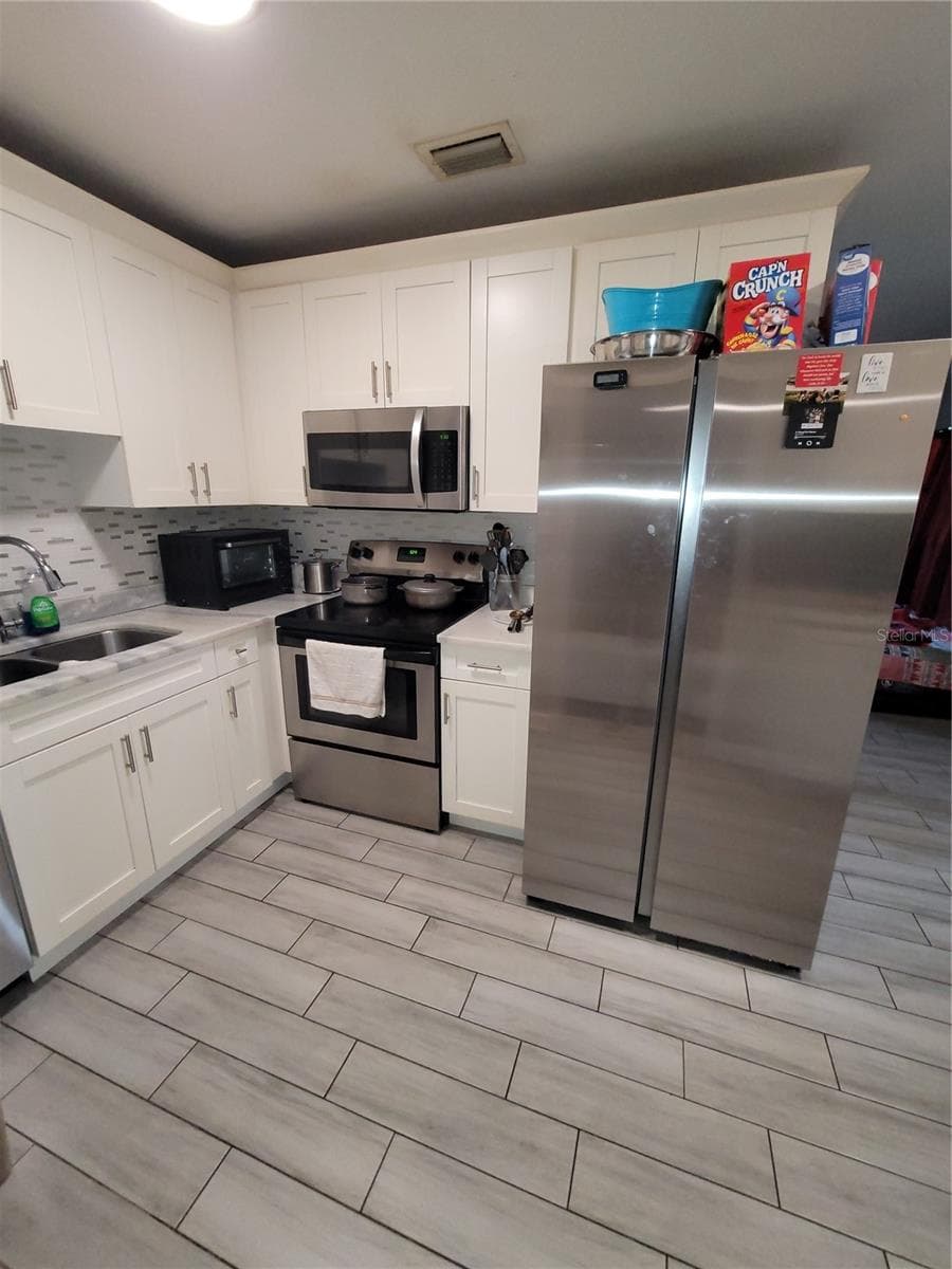 Single Family Residence at 4417 BOOKER T DR, TAMPA, photo 2 of 20