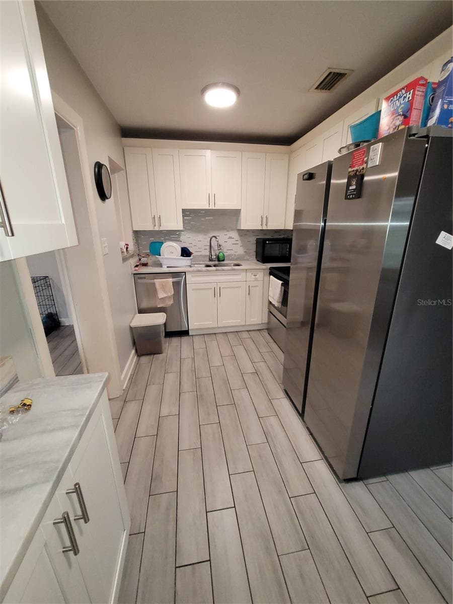 Single Family Residence at 4417 BOOKER T DR, TAMPA, photo 5 of 20