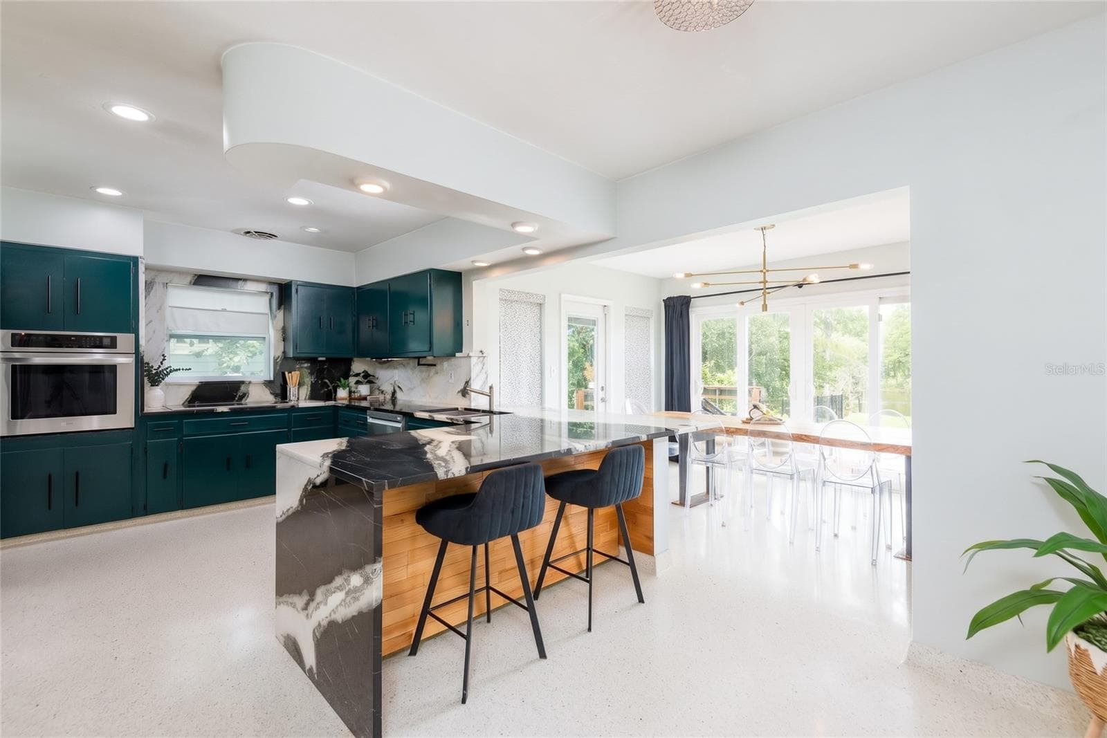 Elegant Dalmata Marble sets the tone in your Kitchen. - 7308 N OLA AVE, TAMPA