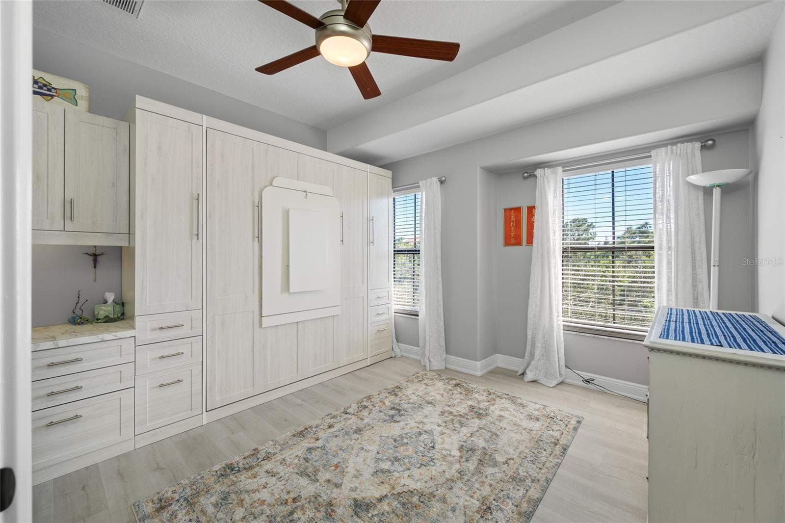 3rd bedroom with build in shelving and Murphy bed (3rd floor) - 580 BELLA LOOP, DUNEDIN