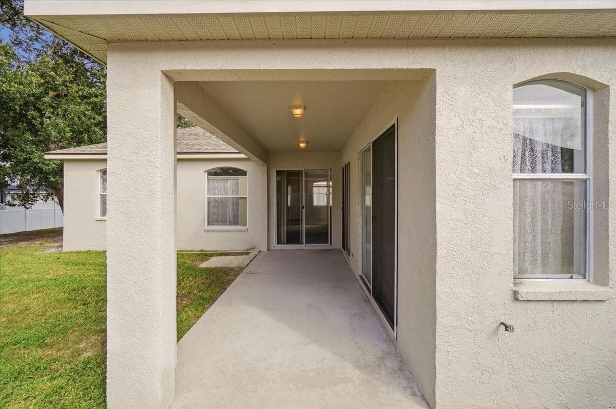 REAR COVERED LANAI/PATIO - 1731 BROOKSTONE WAY, PLANT CITY