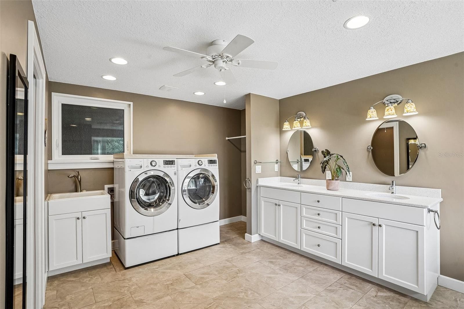 Primary Bath with Laundry - 1501 FAHNSTOCK ST, EUSTIS