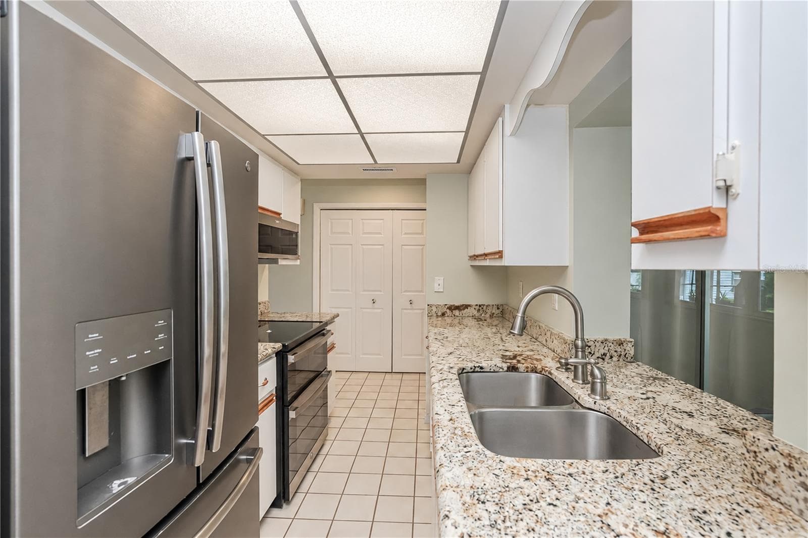 Single Family Residence at 539 WOODLAND AVE NW, PORT CHARLOTTE, photo 13 of 50