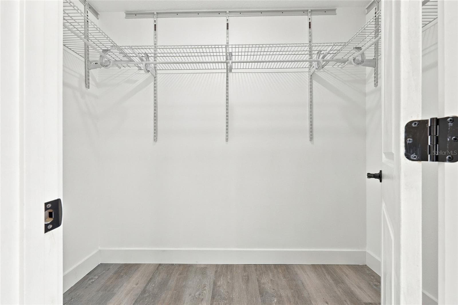 Primary Bedroom Walk-In Closet - 11134 WOODSIDE DR, LEESBURG