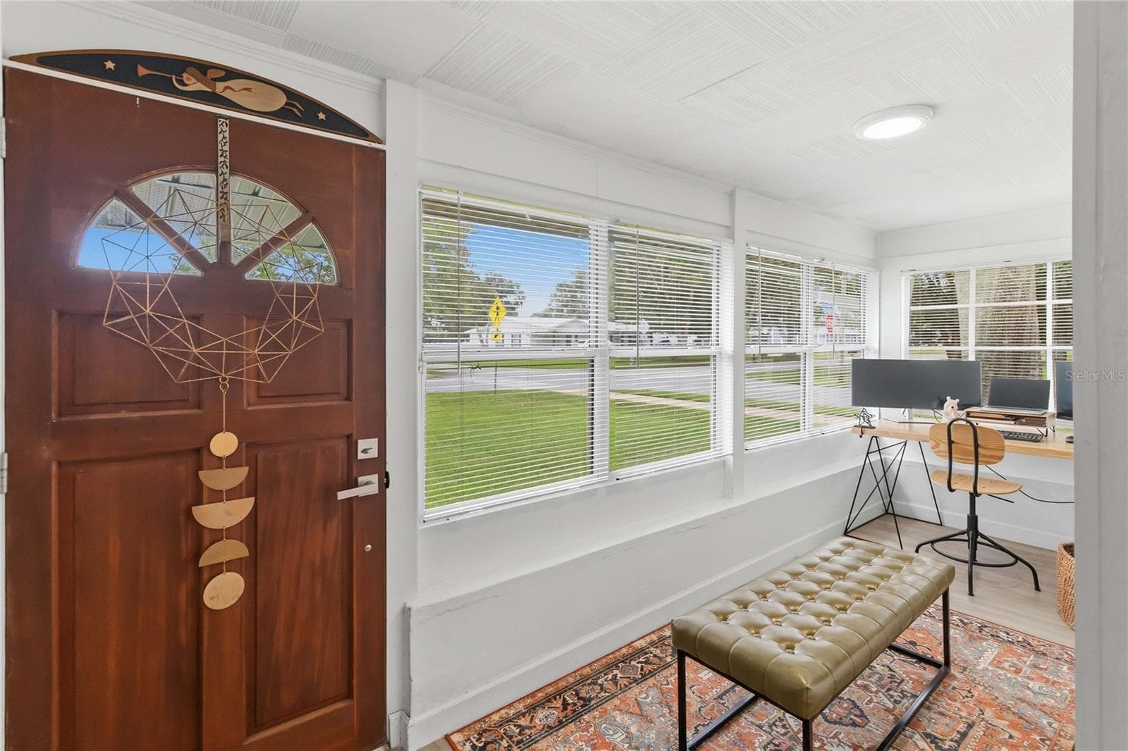 Entry room currently being used as an office. - 438 VIRGINIA AVE, ST CLOUD