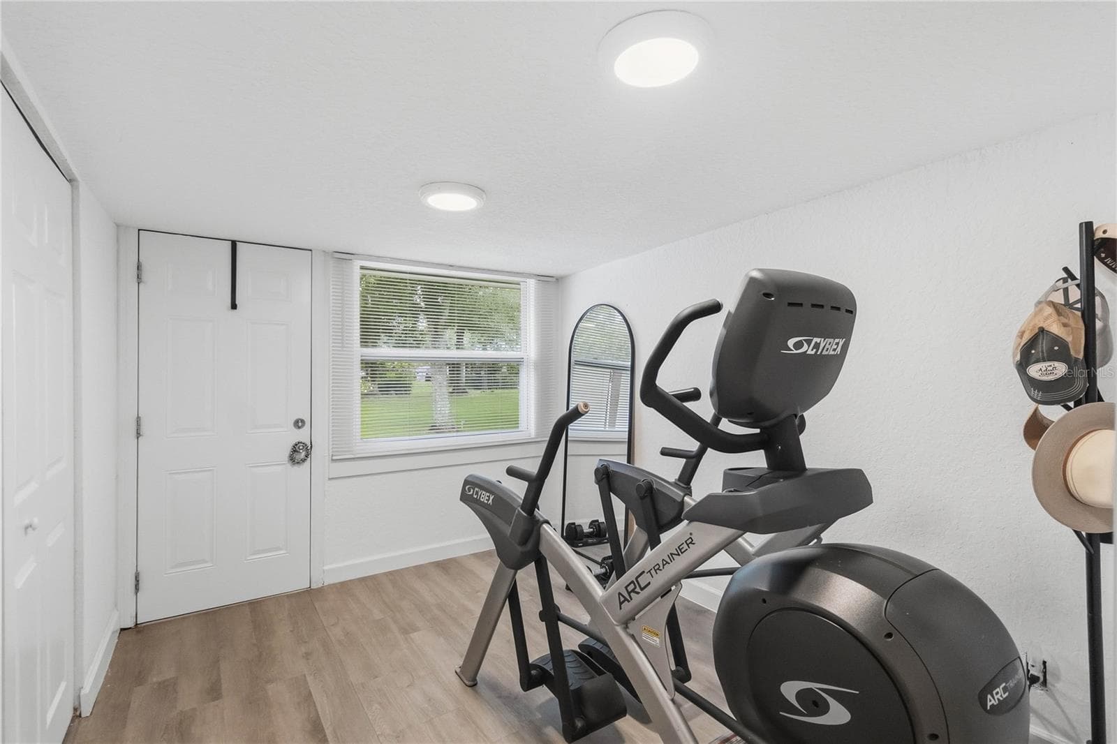 Bonus room is being used as a workout room but could easily be used a 3rd bedroom. - 438 VIRGINIA AVE, ST CLOUD