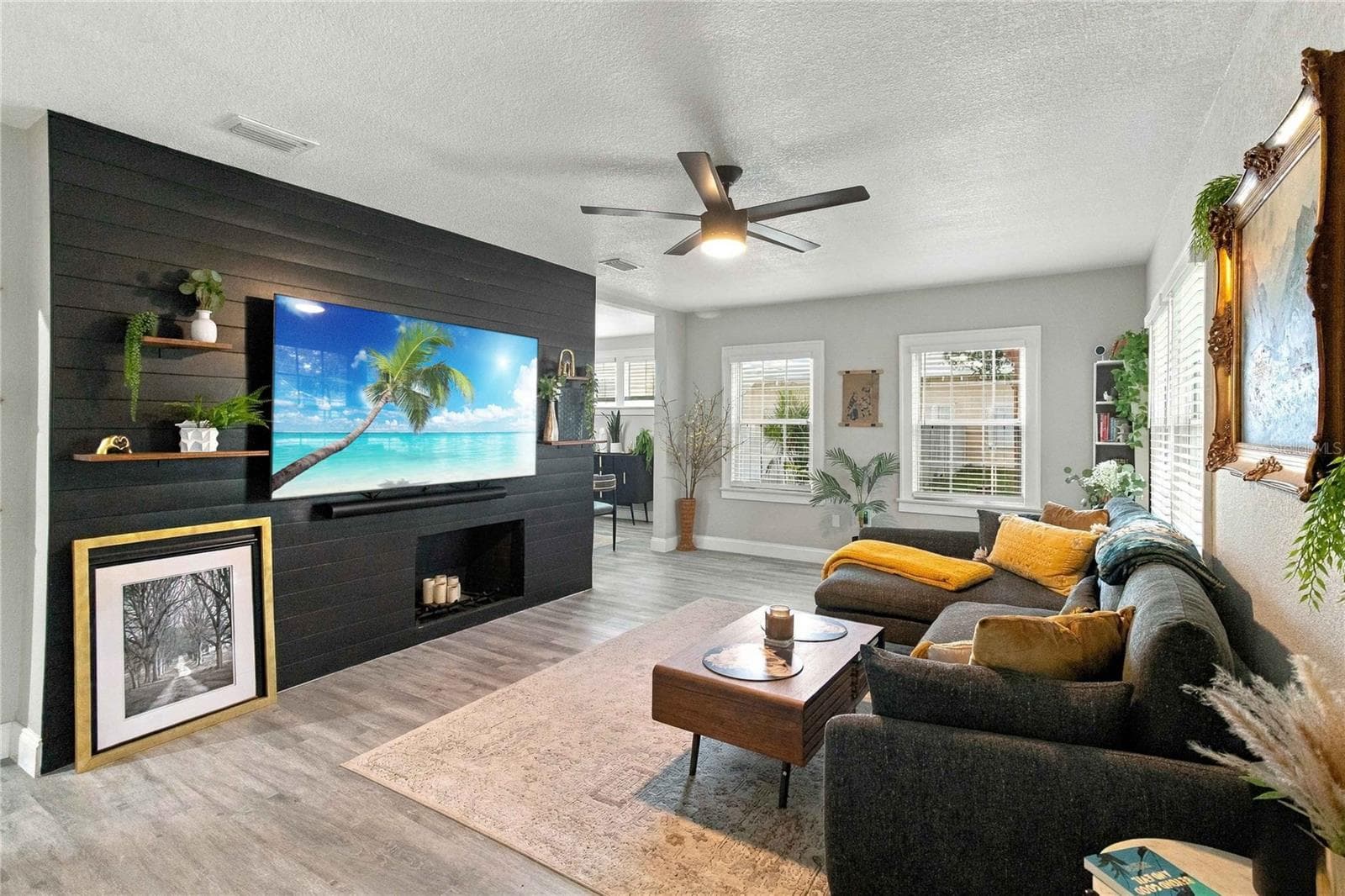 Spacious living room with fireplace. - 430 FLORIDA AVE, ST CLOUD