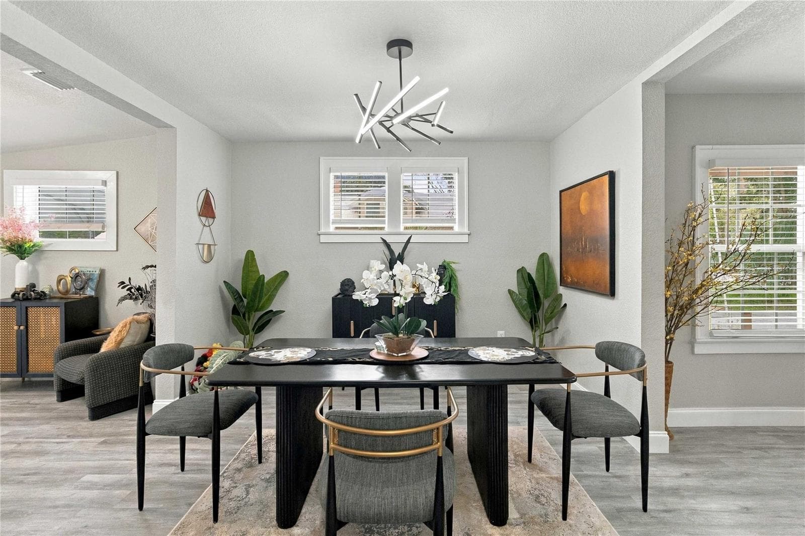 Dining room is open to living room and seating area off the kitchen. - 430 FLORIDA AVE, ST CLOUD