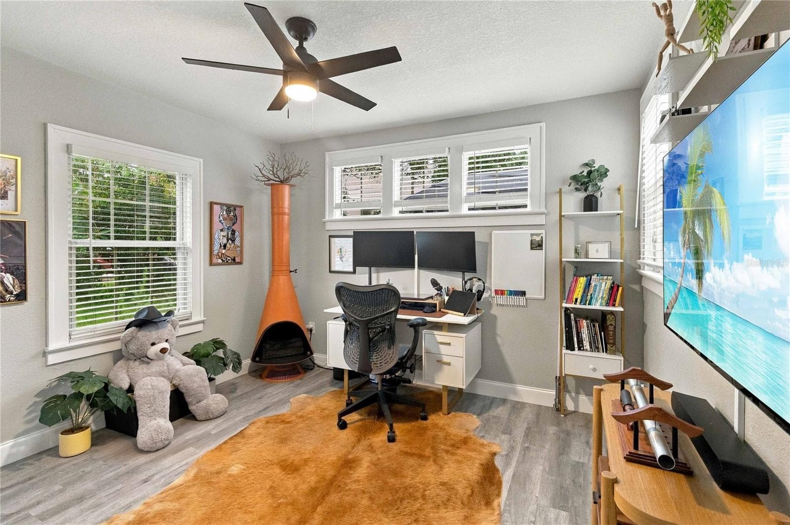 Bedroom 2, located on the first floor. - 430 FLORIDA AVE, ST CLOUD