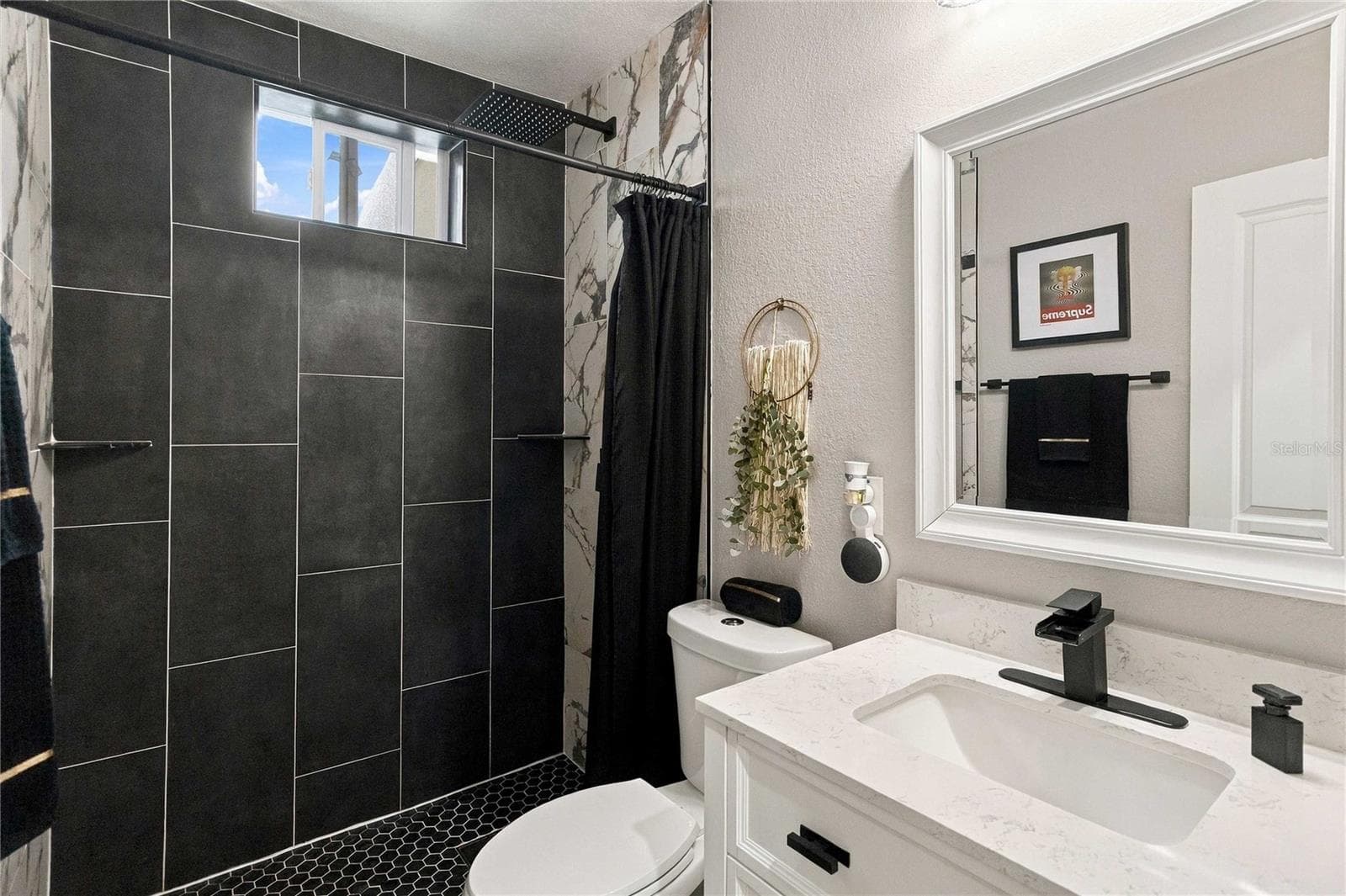 Guest bathroom, located on the first floor - 430 FLORIDA AVE, ST CLOUD