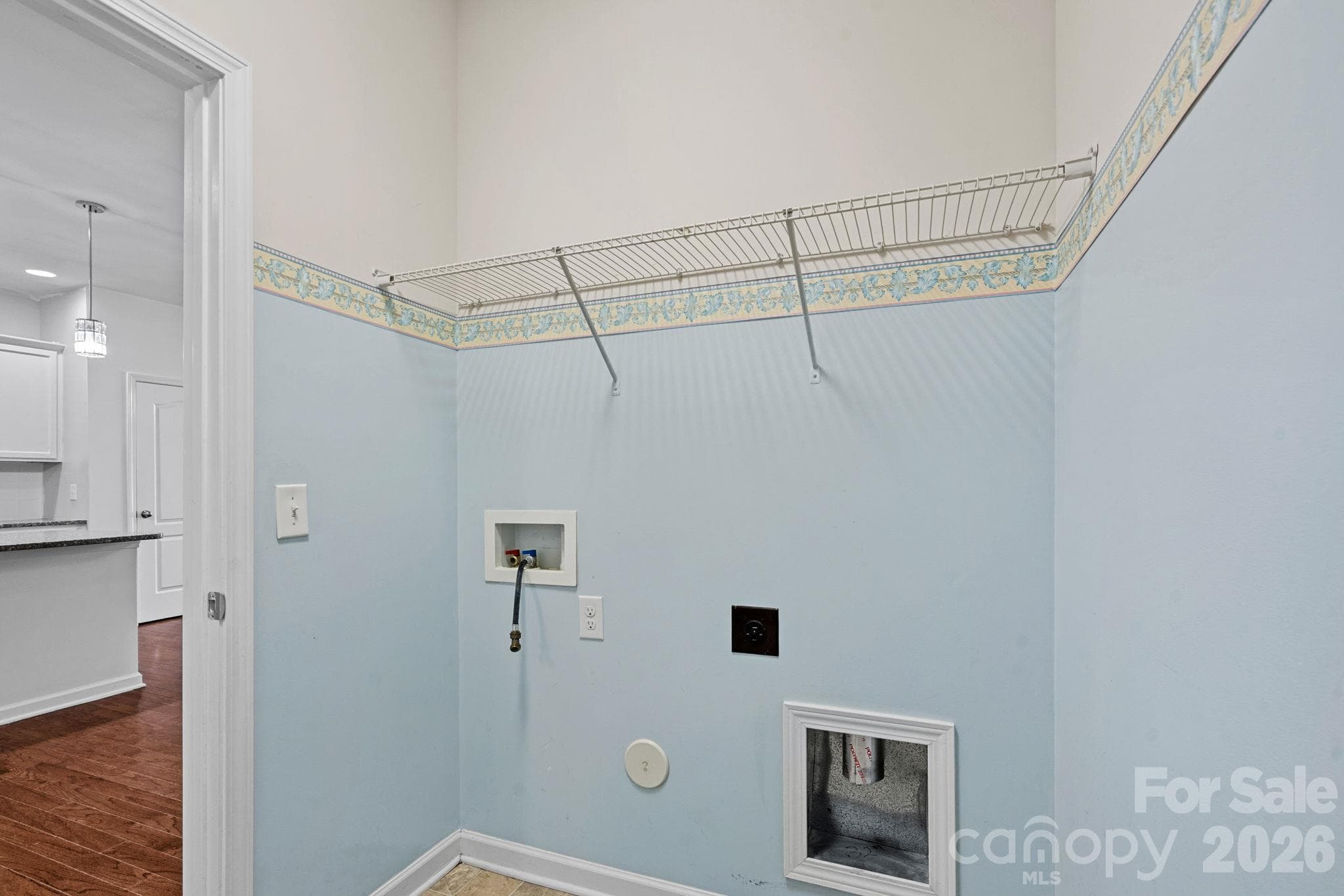 Laundry on main level just off the kitchen - 1555 Spring Blossom Trail, Fort Mill