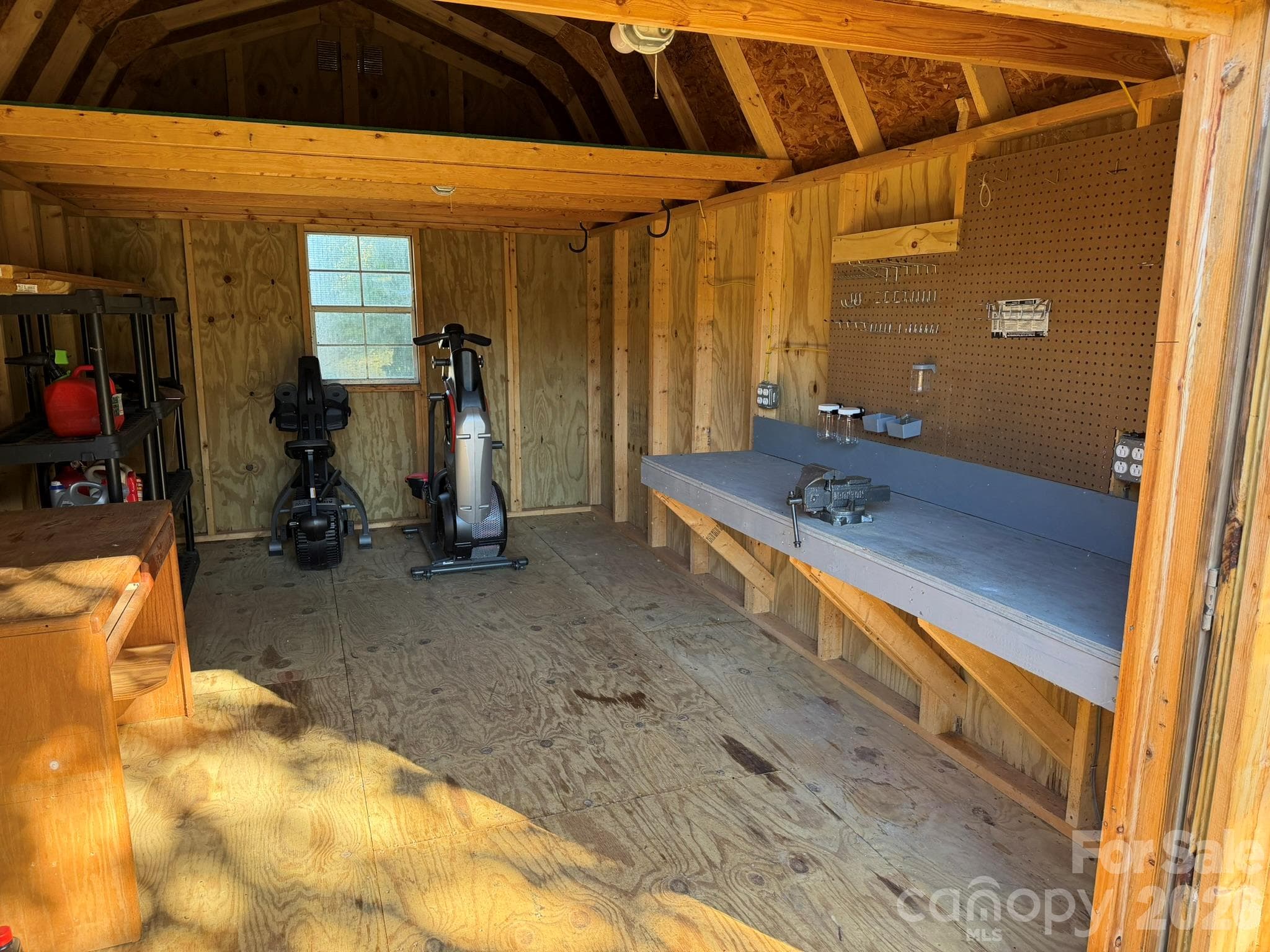 It's sizable enough to store larger items, such as lawn tractors. - 202 Banyan Road, Candler