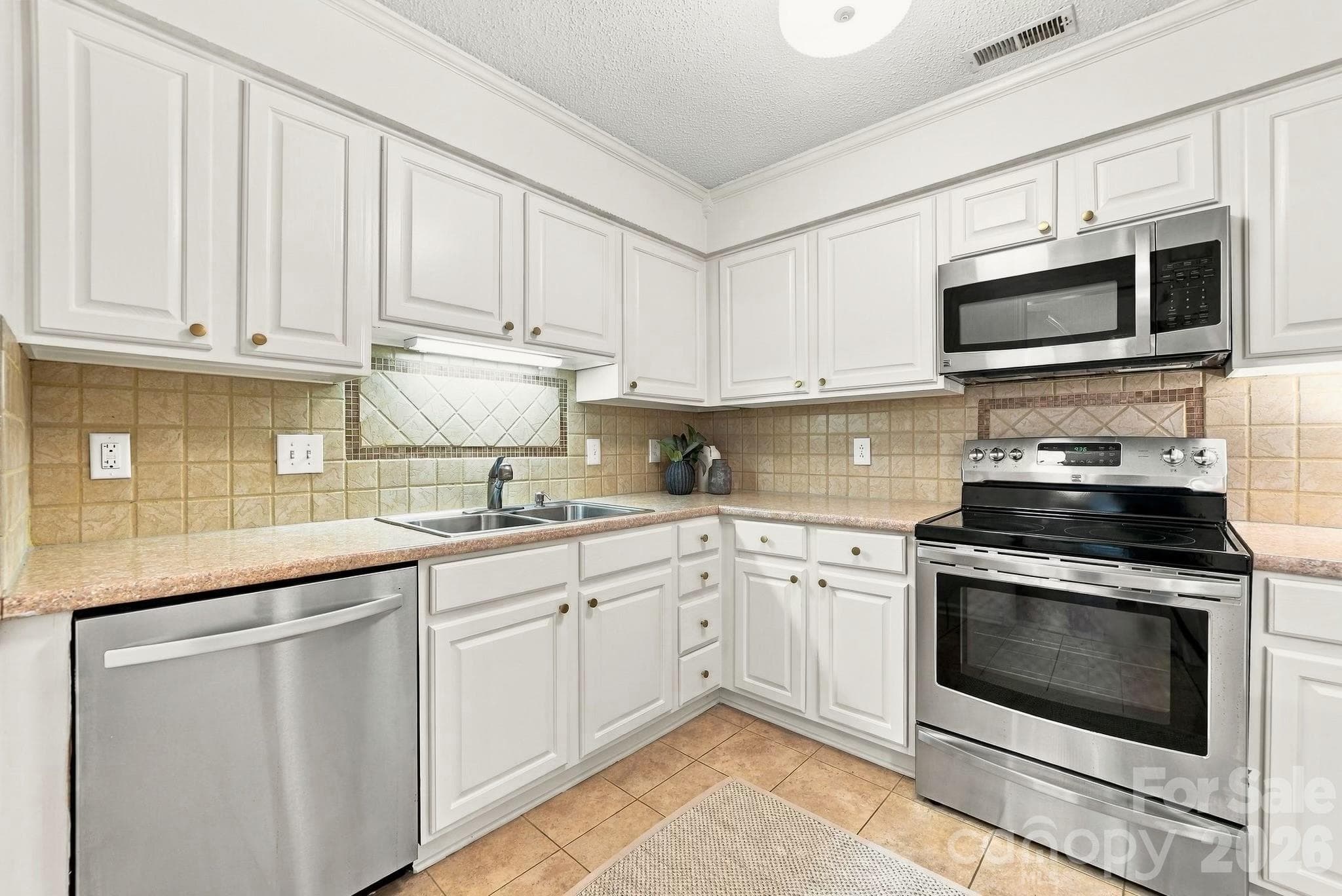 New kitchen light fixture - 1051 Churchill Downs Court, Charlotte