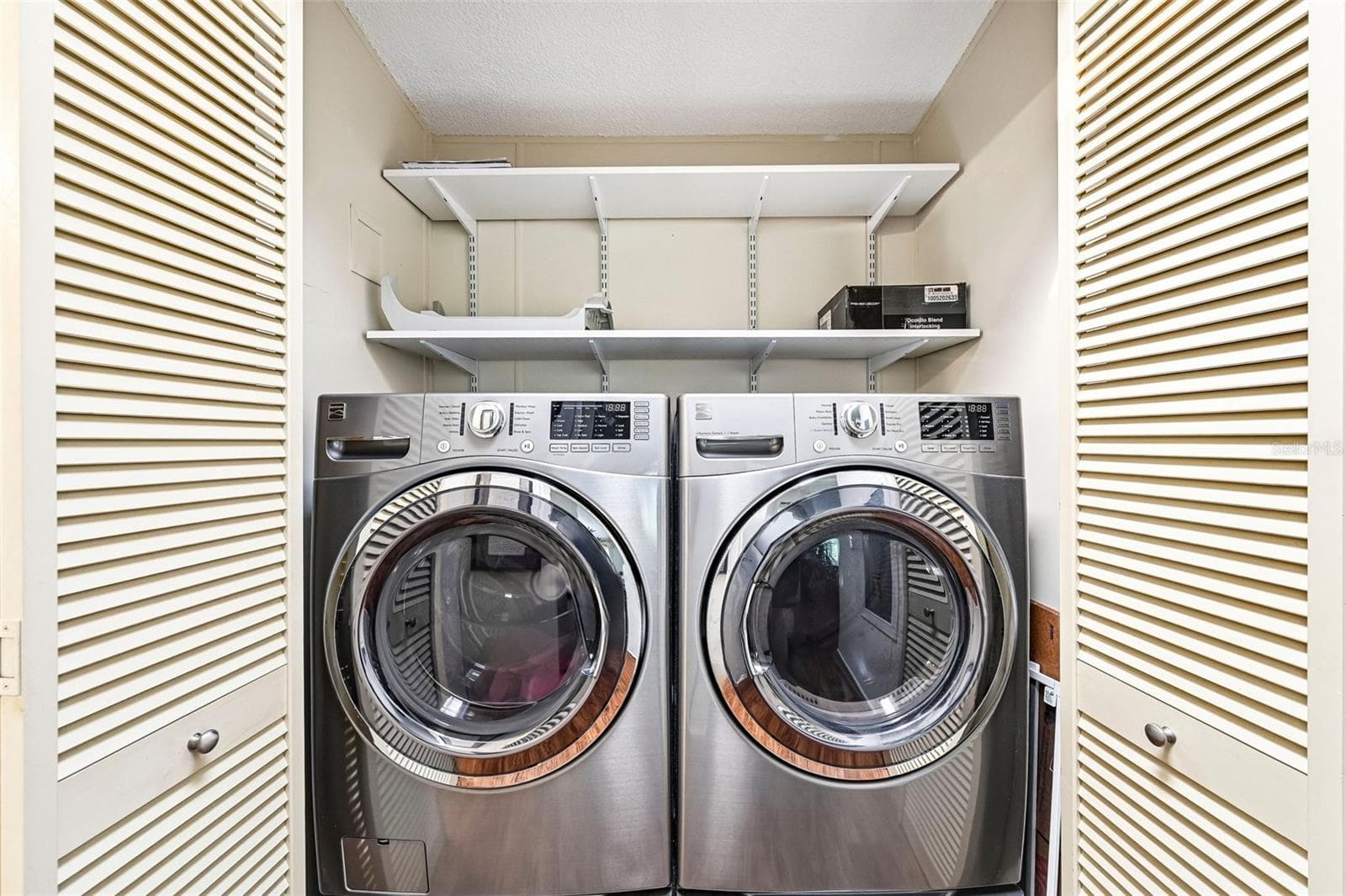 Front Loading Washer & Dryer in Closet in Hallway - 8510 COUNTESS AVENUE CIR, PALMETTO