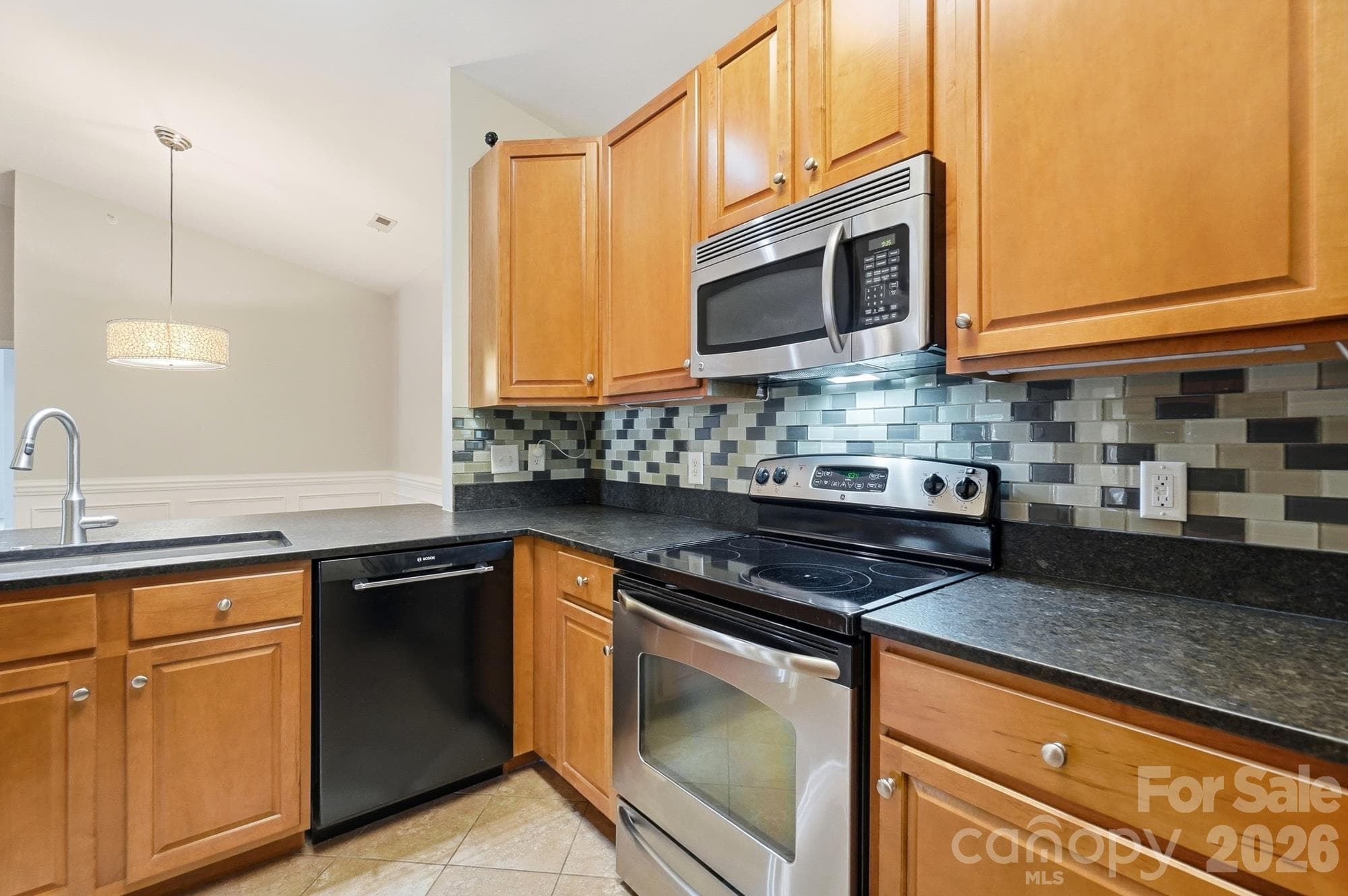 Kitchen w/ Leather Granite Counter Tops - 16752 Amberside Road, Cornelius