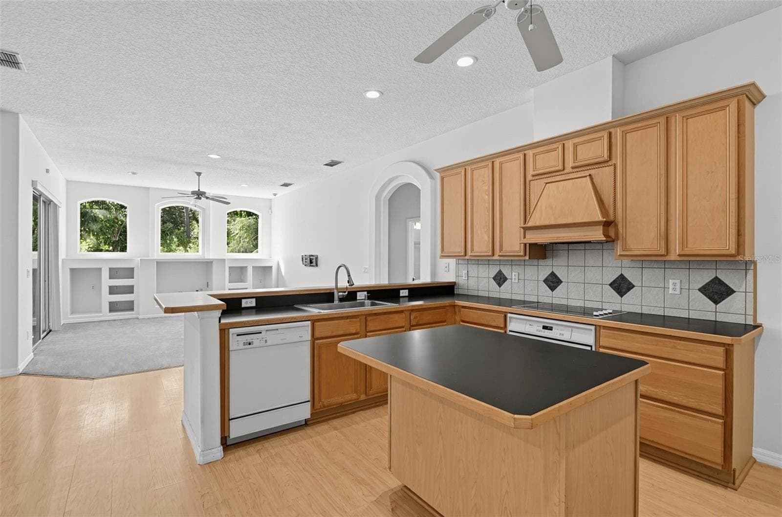 2 SEATER KITHEN ISLAND AND 4-5 SEATS CAN BE USED FOR THE KITCHEN BAR - 13838 RIVERPATH GROVE DR, ORLANDO