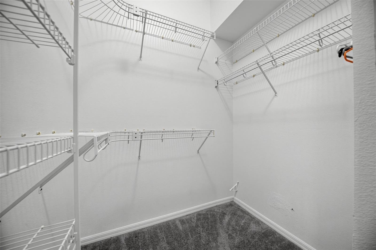 WALK IN CLOSET 2 IN PRIMARY SUITE - 13838 RIVERPATH GROVE DR, ORLANDO