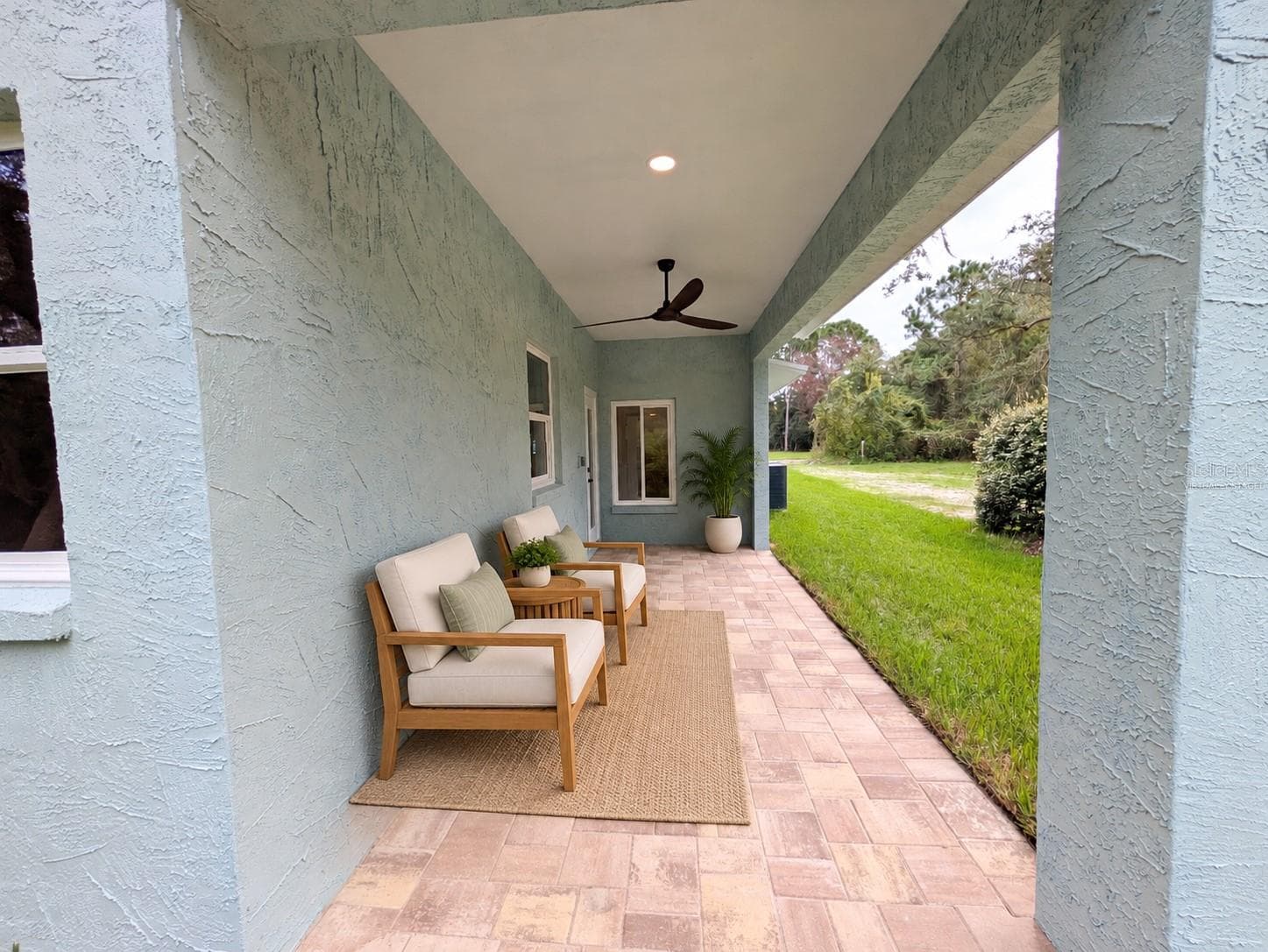 back porch Virtually staged - 2748 GLENWOOD AVE, NEW SMYRNA BEACH