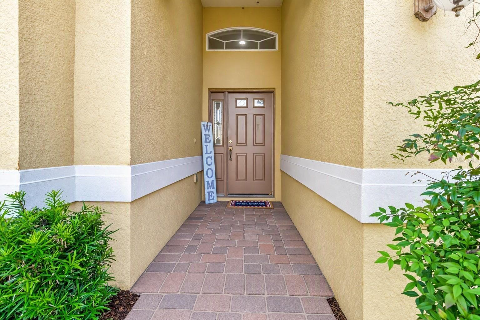 AI edited photo of front door - 4877 GRASSY KNOLL DR, TAVARES