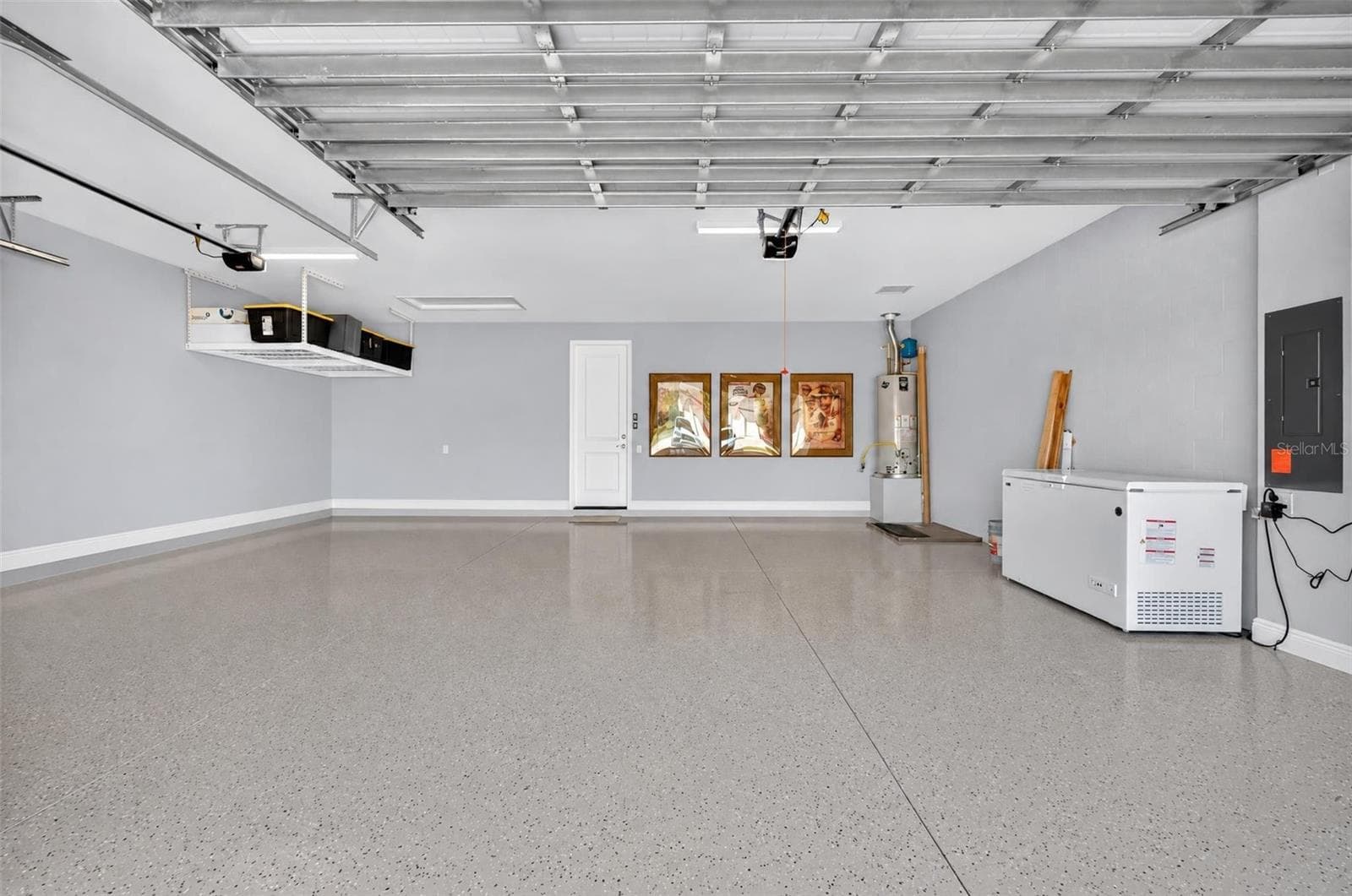 3 car garage with epoxy and overhead storage - 12214 GOLDENROD AVE, BRADENTON