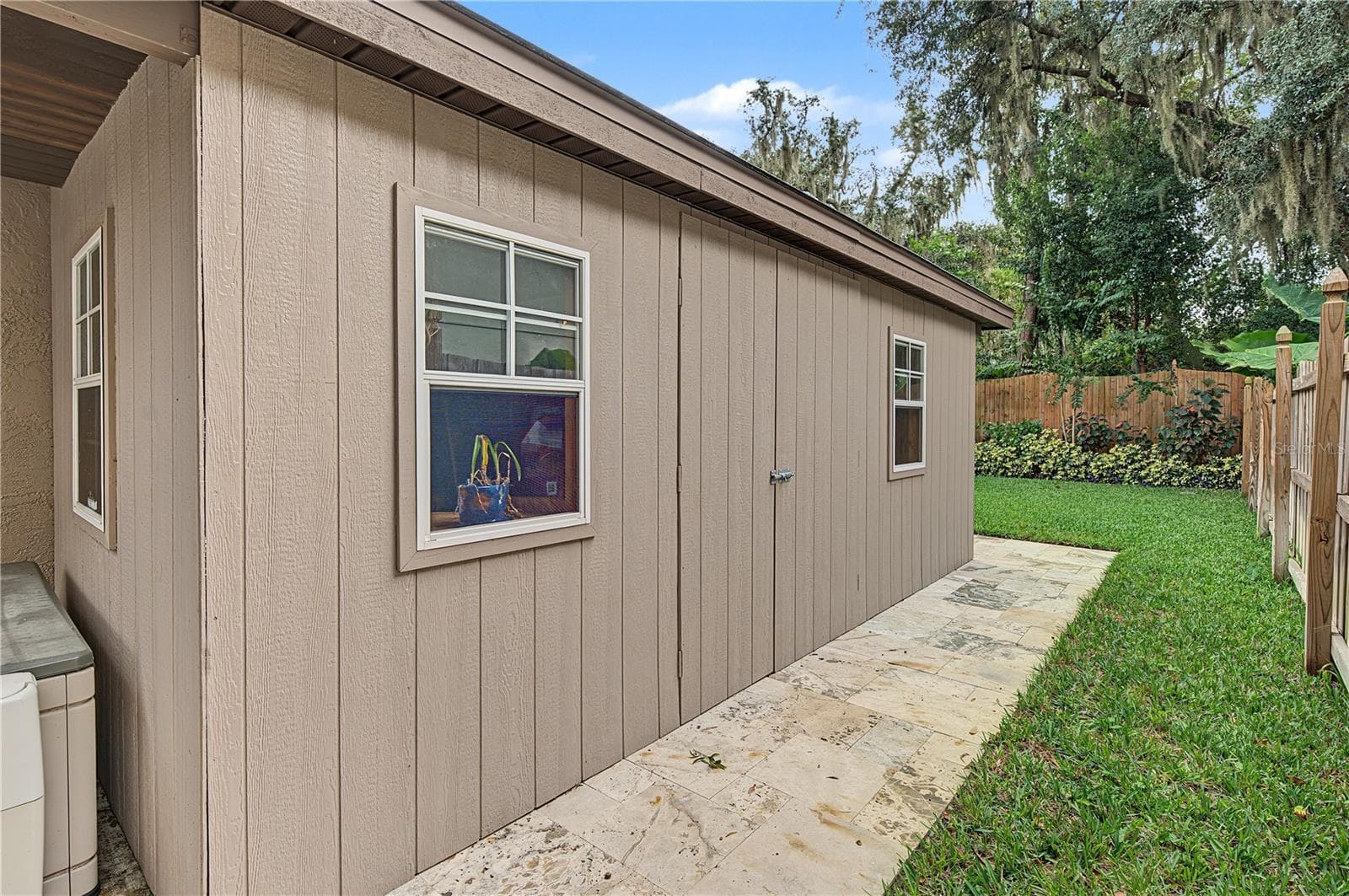 Side shed in back yard on cement slab - 5644 GLENCREST BLVD, TAMPA