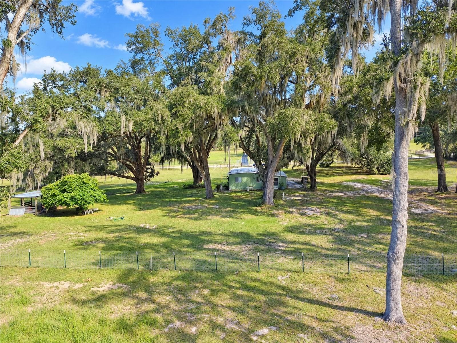Northwest Corner view to home - 2930 GRIFFIN AVE, LADY LAKE