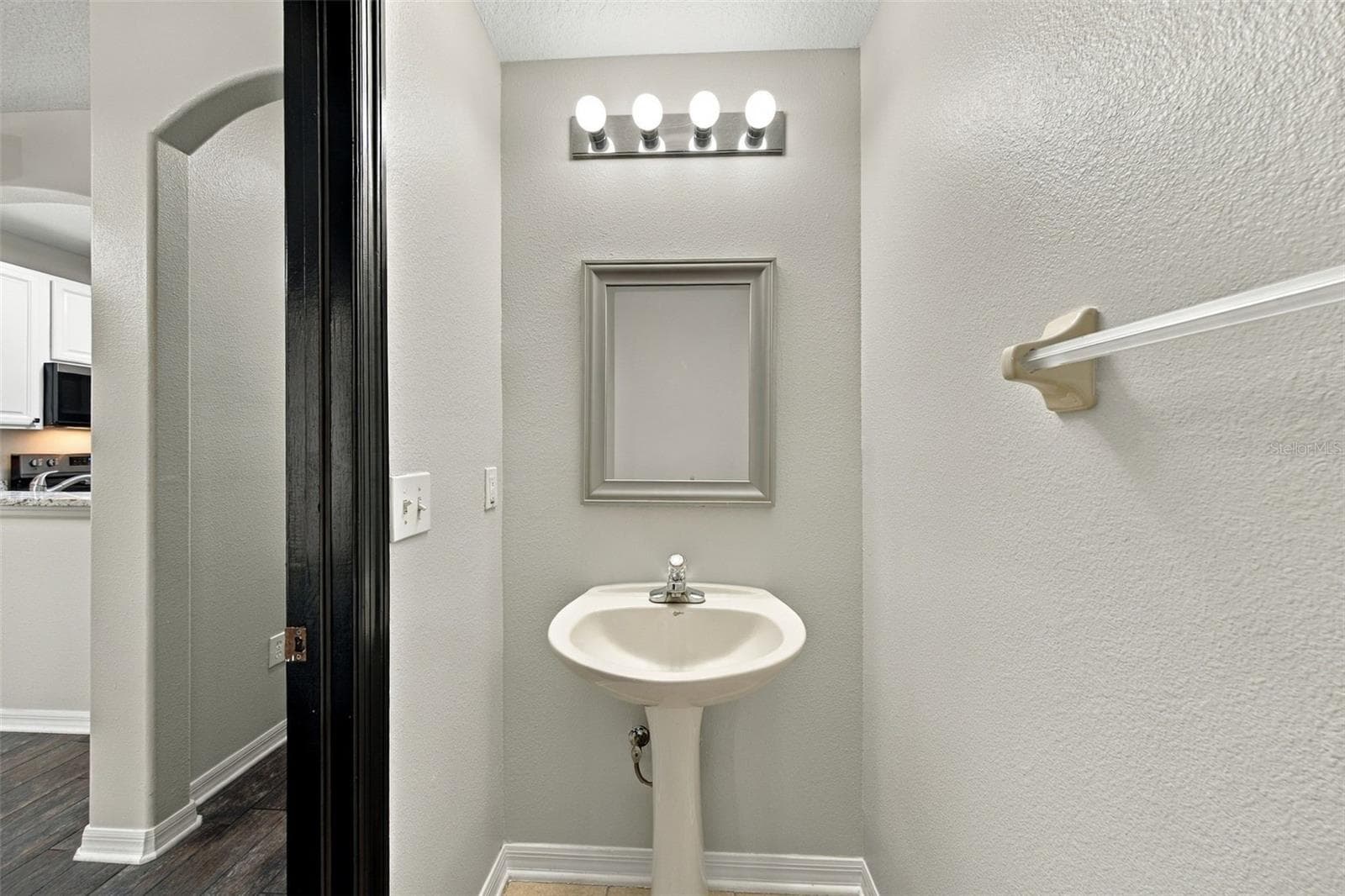 1/2 bath-first floor - 30316 ELDERWOOD DR, WESLEY CHAPEL