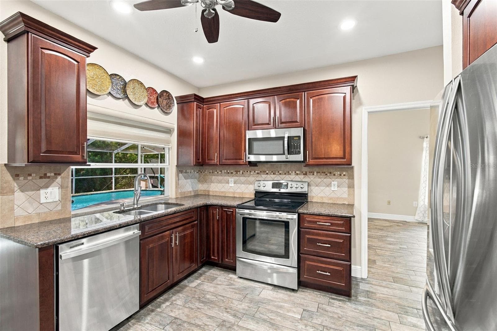 Single Family Residence at 7700 CYPRESS TRACE CT, NEW PORT RICHEY, photo 5 of 76