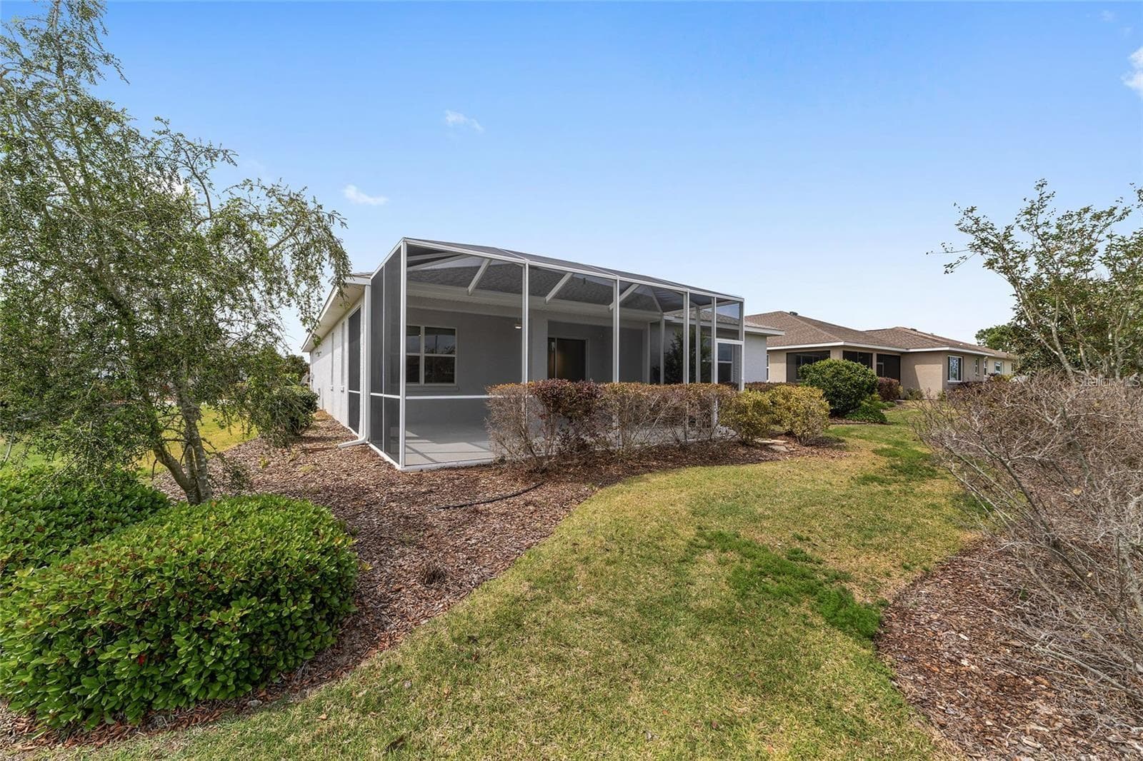 Caged Lanai Exterior - 9979 SW 88TH LOOP, OCALA