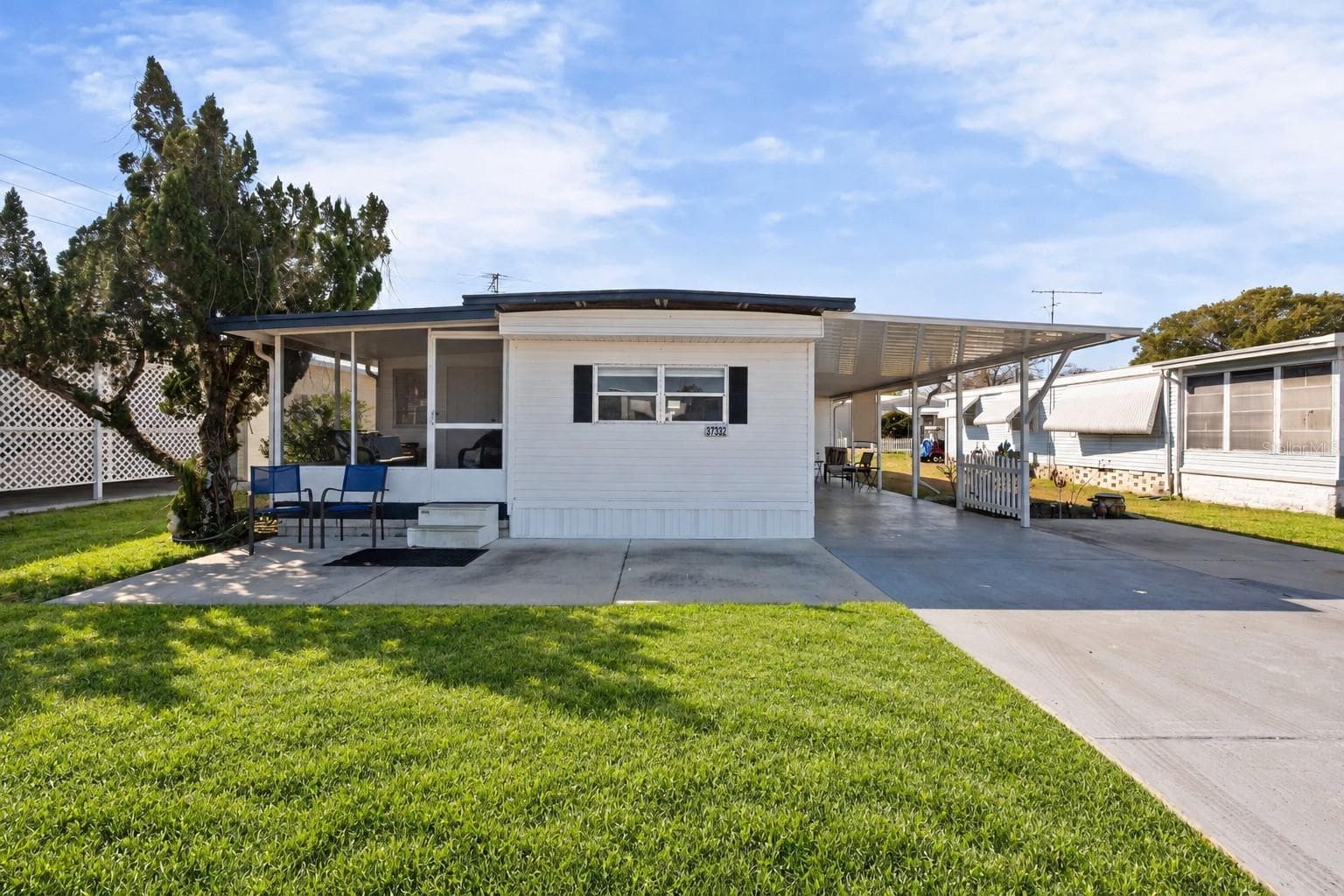 Mobile Home at 37332 SANDRA AVE, ZEPHYRHILLS, photo 2 of 62