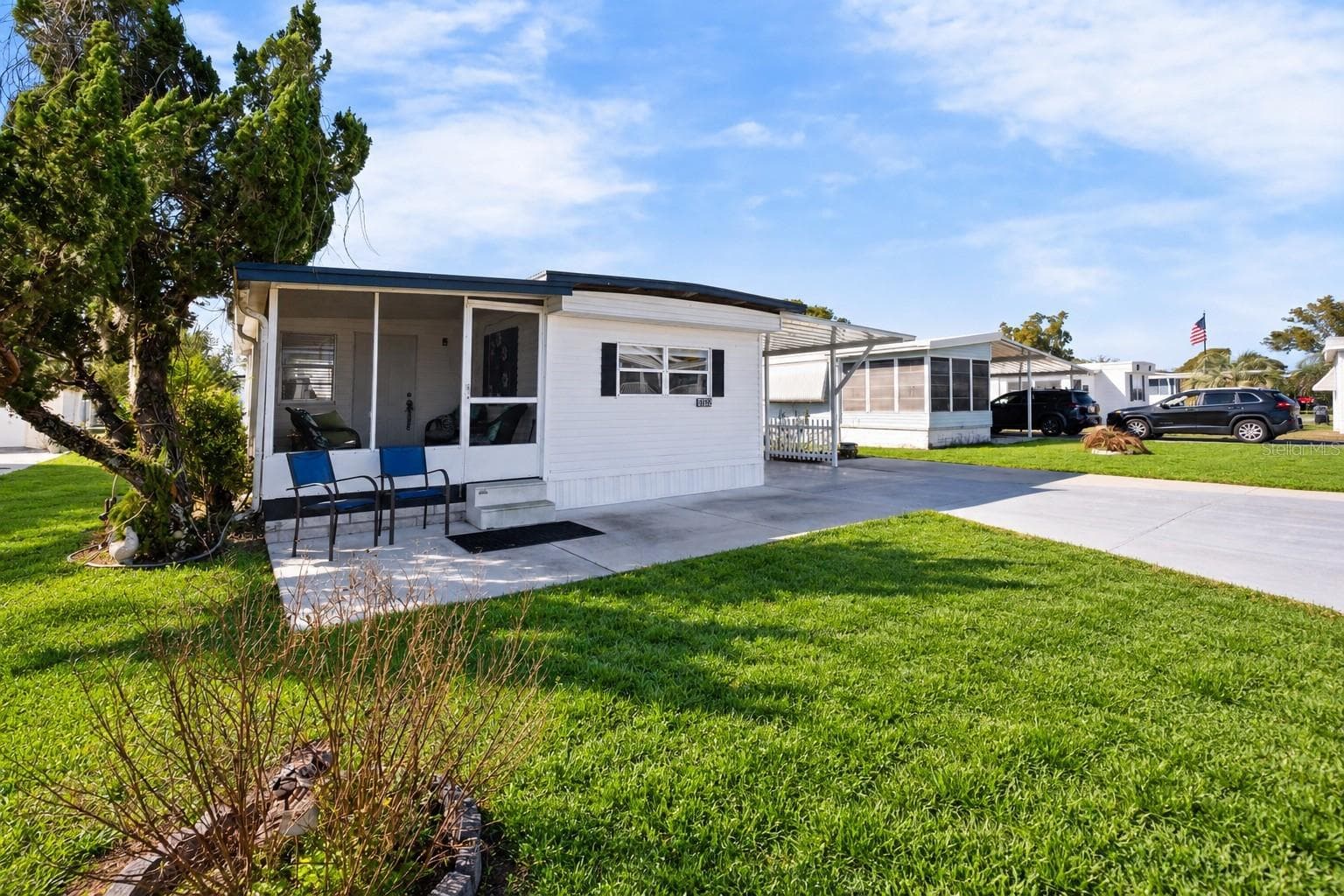 Mobile Home at 37332 SANDRA AVE, ZEPHYRHILLS, photo 3 of 62
