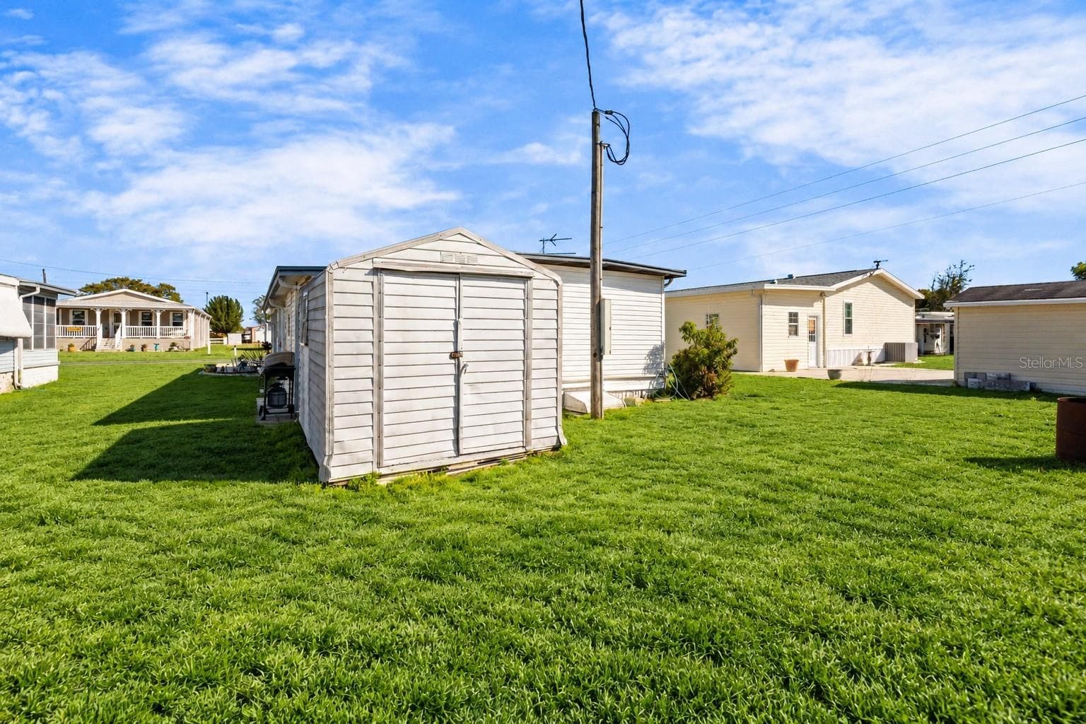 Detached storage shed. - 37332 SANDRA AVE, ZEPHYRHILLS