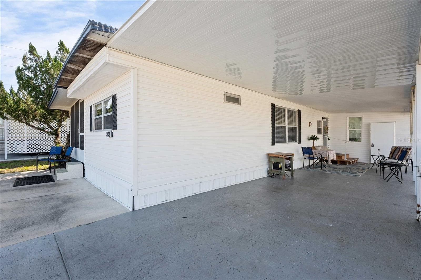 Painted driveway. - 37332 SANDRA AVE, ZEPHYRHILLS