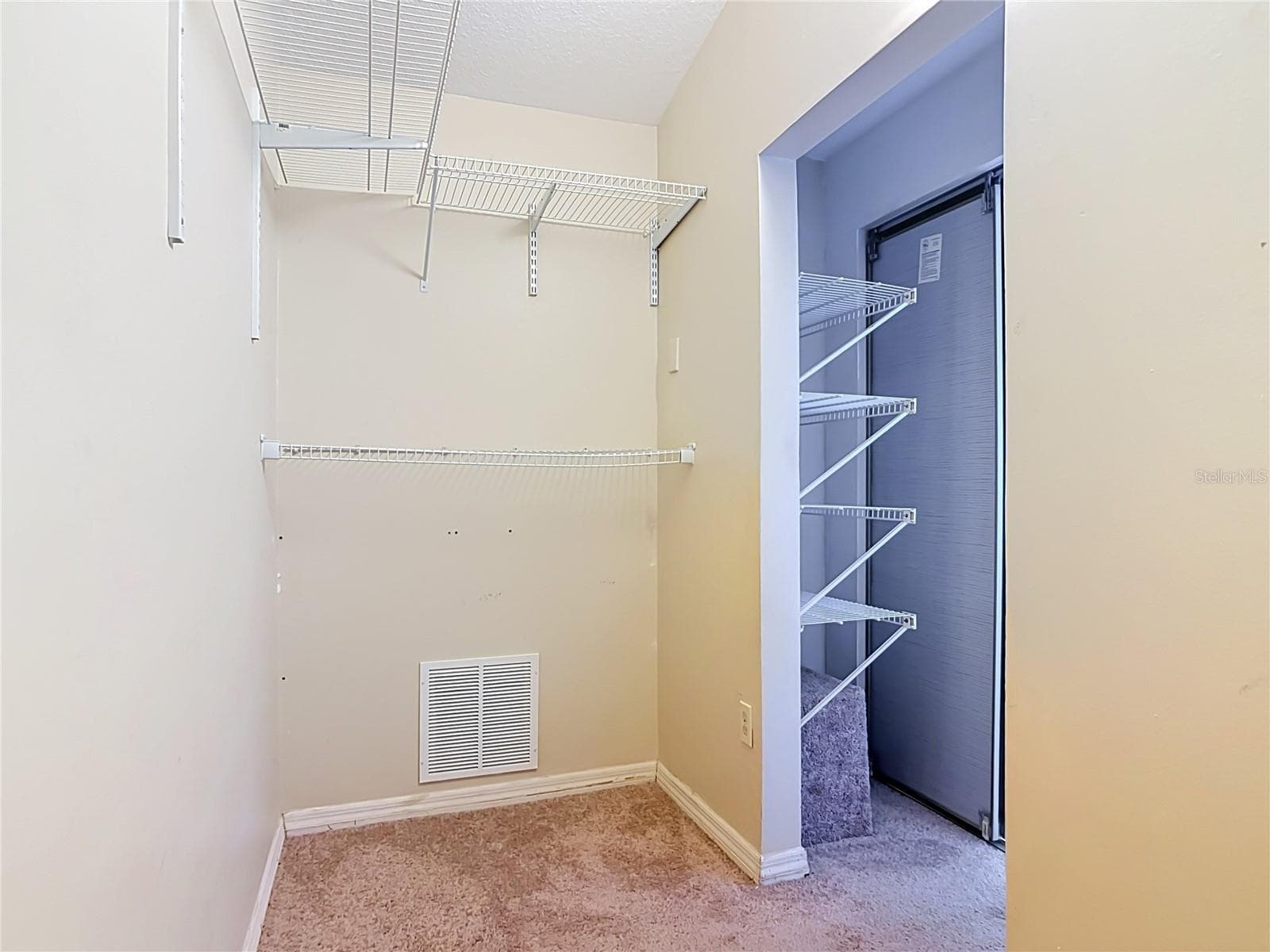 Primary Closet 2 - 510 BROKENSHIRE DR, DEBARY