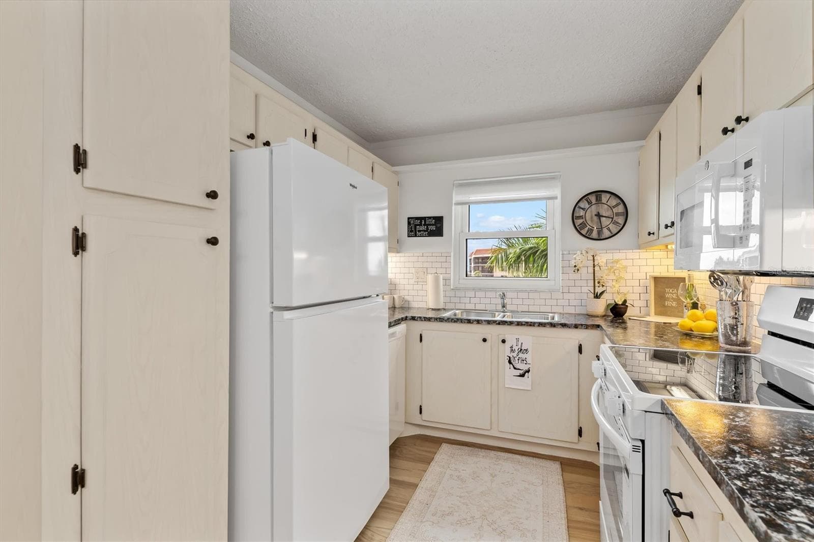 Updated kitchen - 25188 MARION AVE #A301, PUNTA GORDA