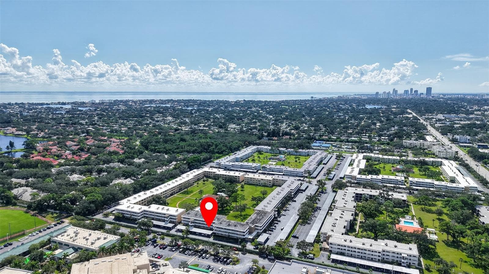 Aerial shot of Winston Park Northeast with DTSP and Tampa Bay, - 5095 BAY ST NE #104, ST PETERSBURG