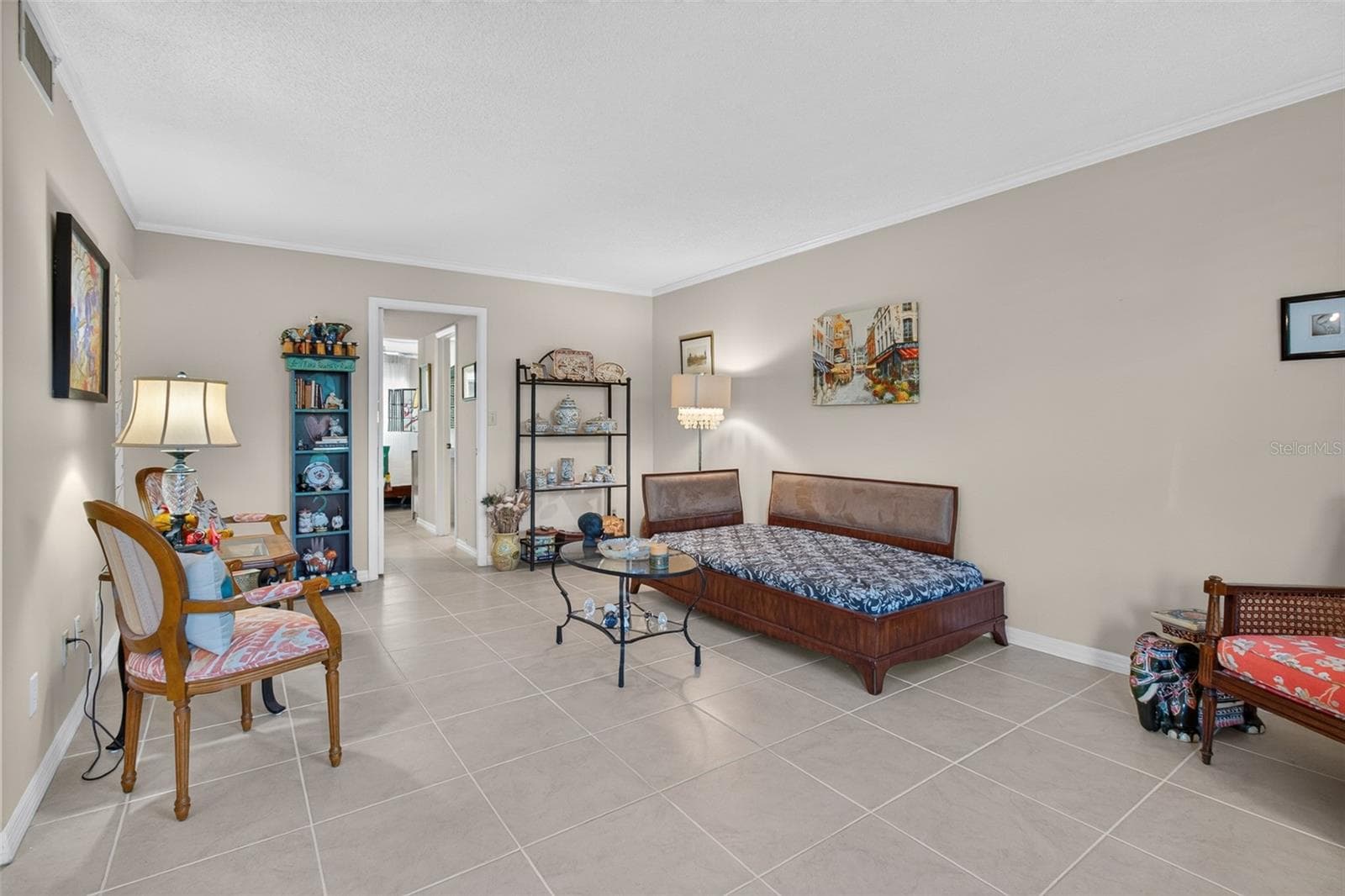 Living room with doorway to ensuite bedroom - 5095 BAY ST NE #104, ST PETERSBURG