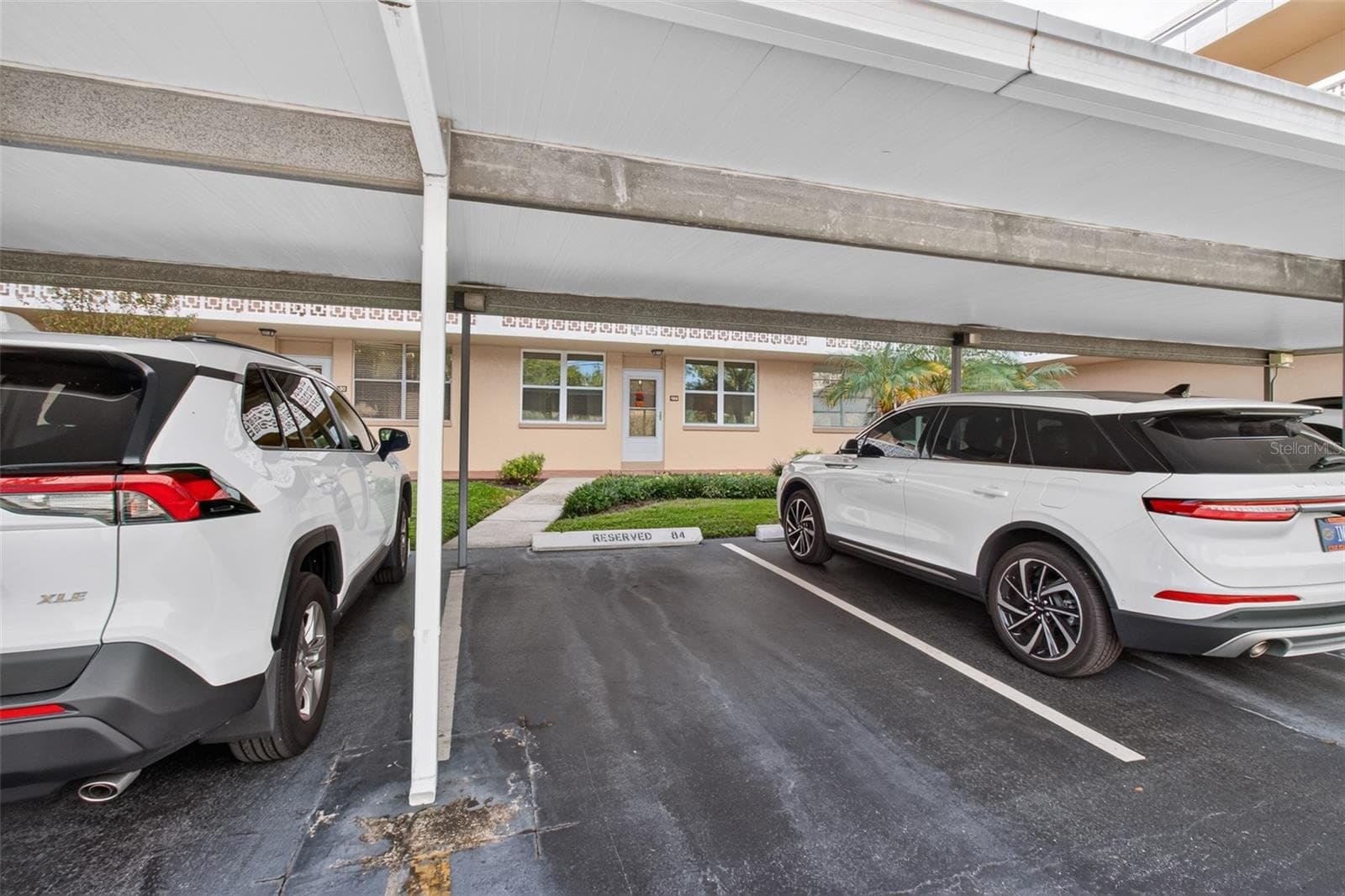 Deeded parking space #84 in front of unit - 5095 BAY ST NE #104, ST PETERSBURG