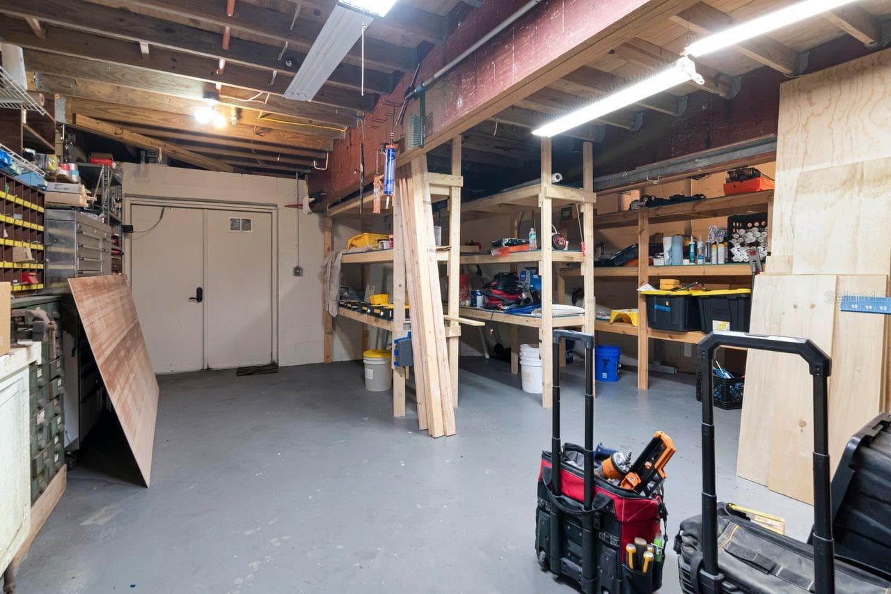 workshop downstairs - 109 OLD OAK LN, PALM HARBOR