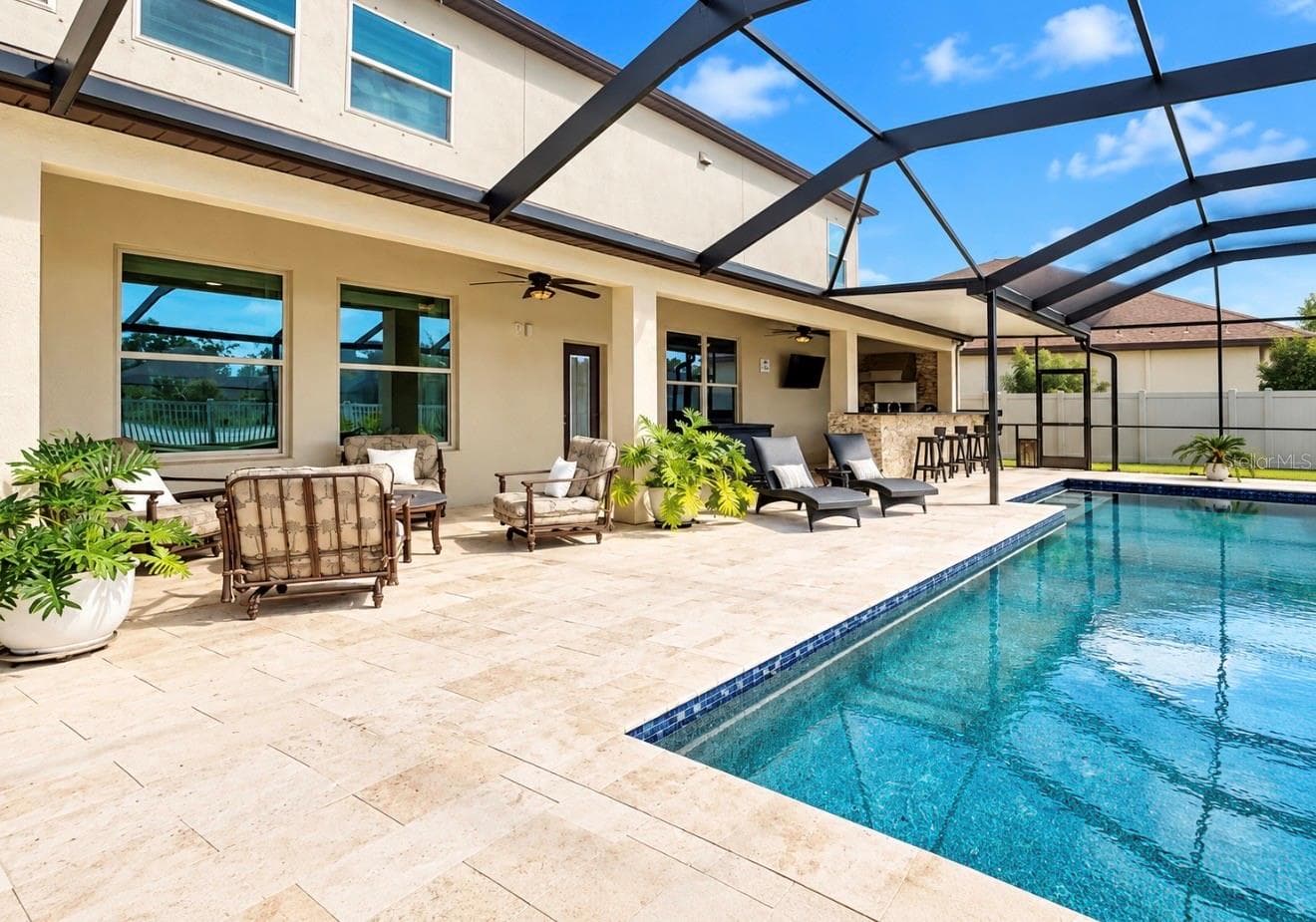TRAVERTINE ENTERTAINING SPACE - 10411 CARDERA DR, RIVERVIEW