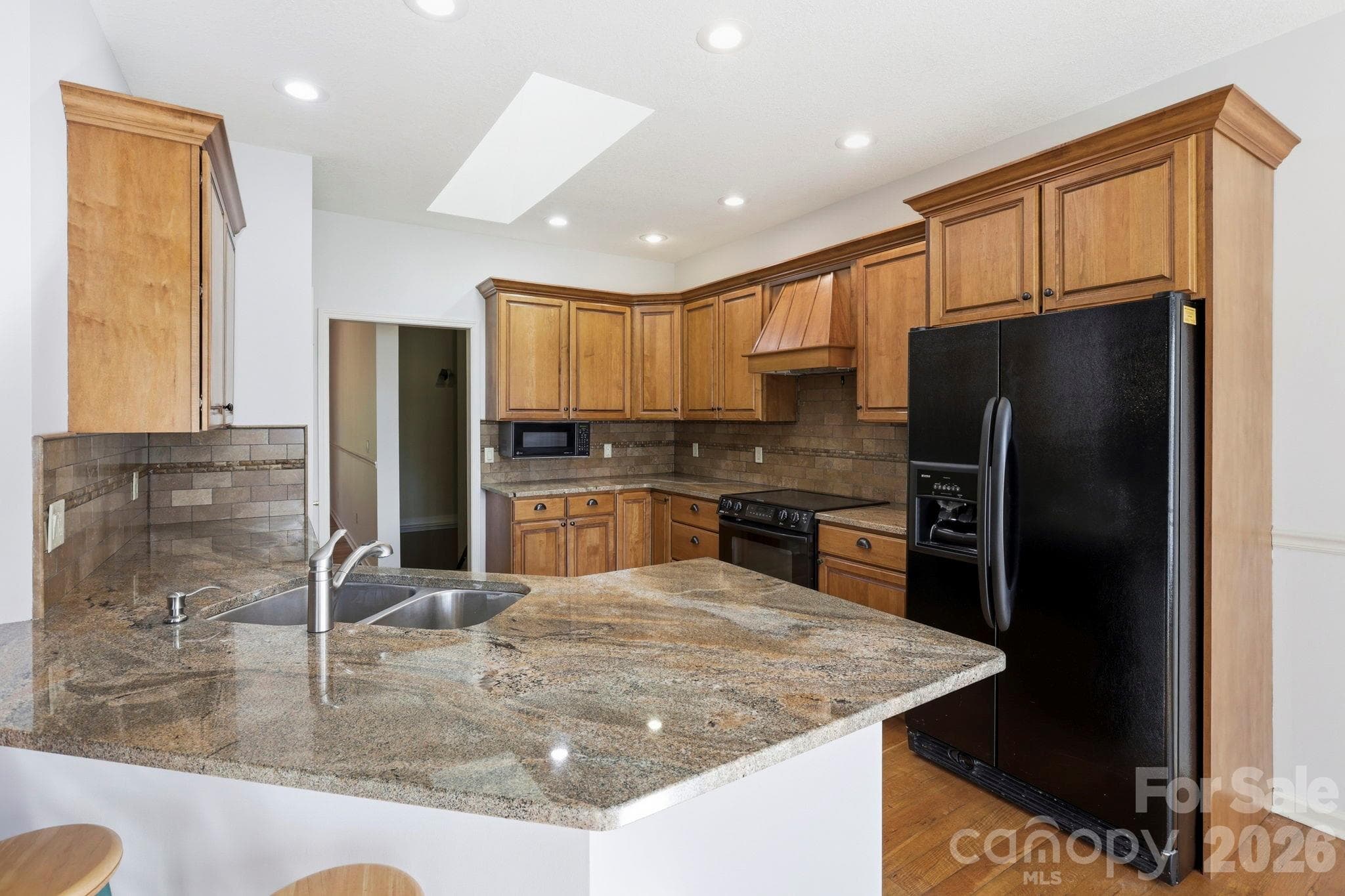 Kitchen with Granite Counters and Breakfast Bar - 17 Ashton Forest Court, Hendersonville