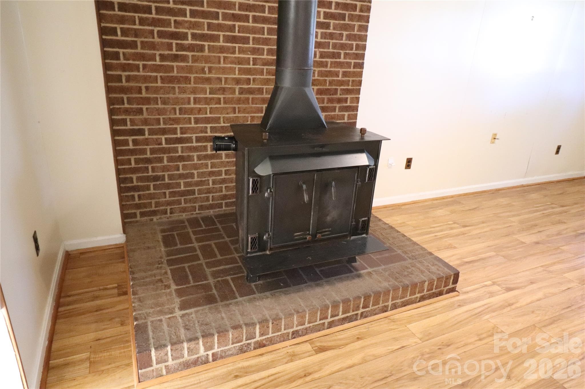 Wood Stove in Family Room - 2157 Ridgewood Drive, Gastonia