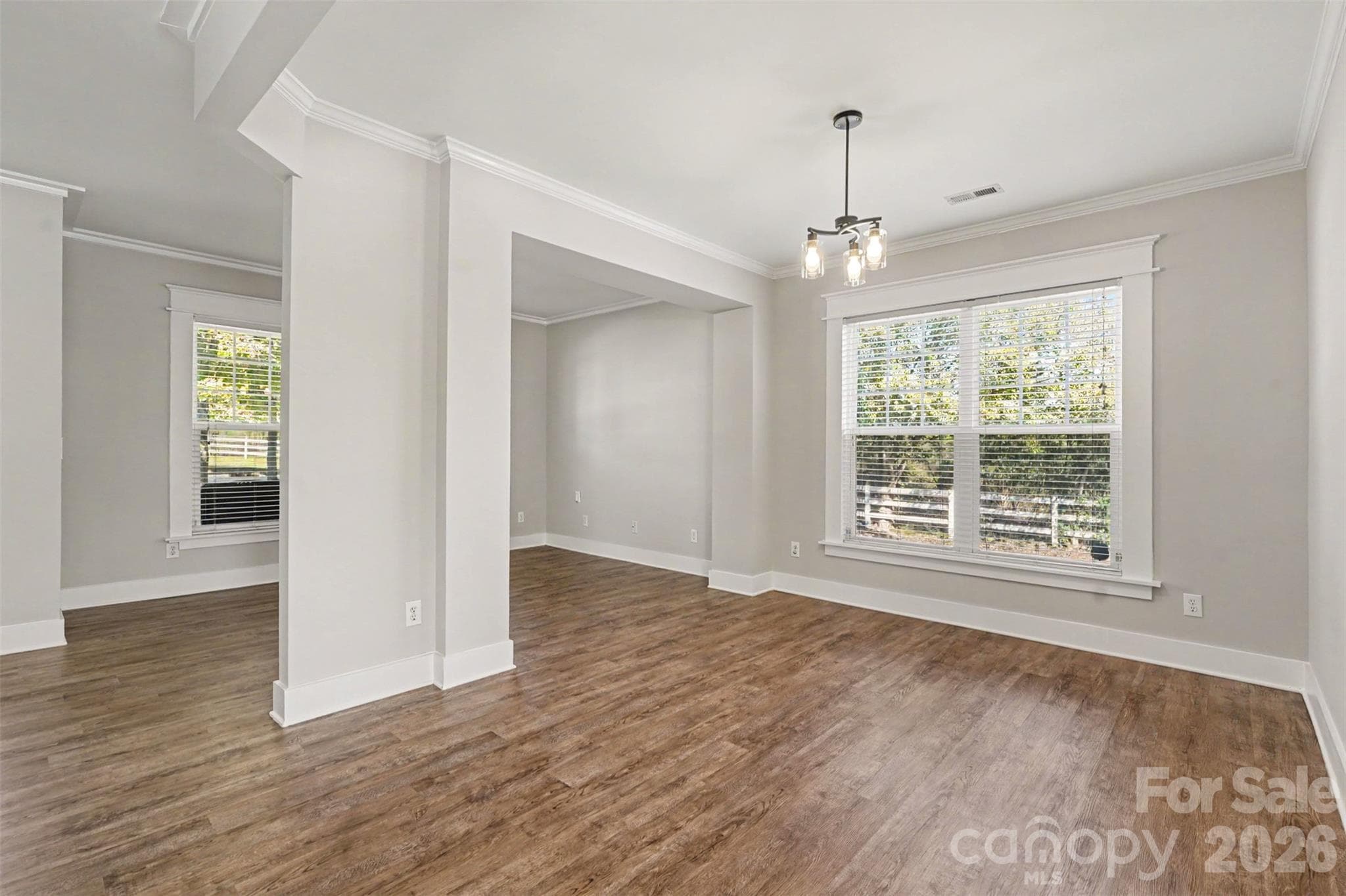 Another view of the Formal Dining Room which leads to the Flex Room (Living Room- Study etc..) You Decide how to use these spaces with unlimited potential. Fresh, neutral paint. - 3585 Leighton Drive SW, Concord
