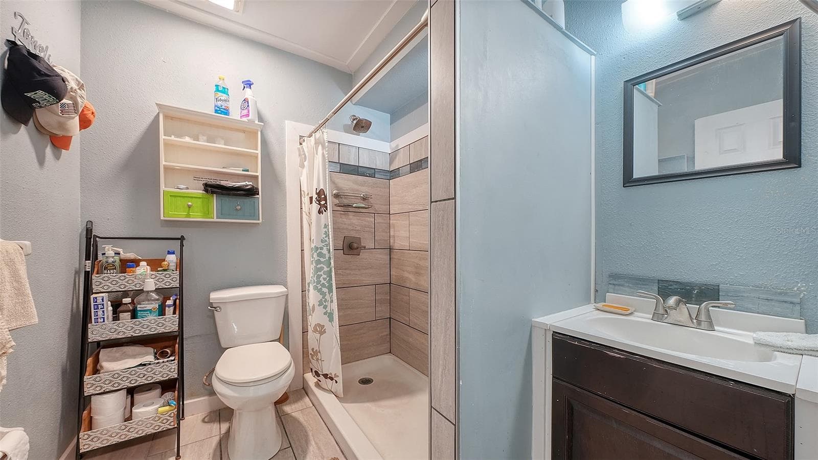 Ground floor under Unit A, efficiency apartment or in-law suite bathroom. - 2514 AVENUE B, BRADENTON BEACH
