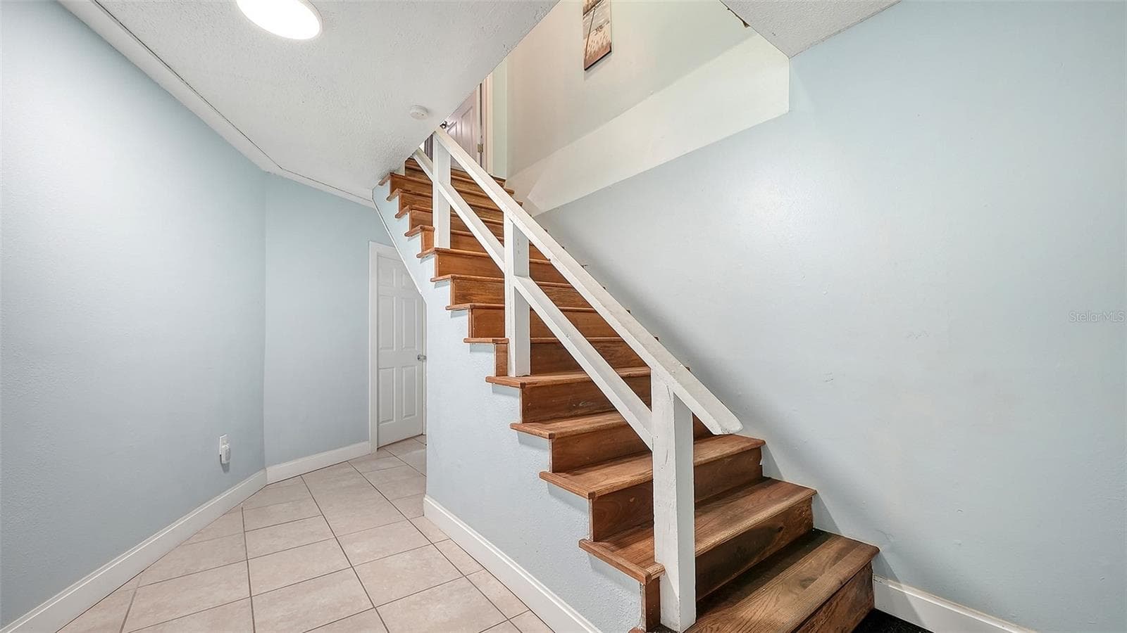 Unit A, entry hallway and stairs to Unit A. - 2514 AVENUE B, BRADENTON BEACH