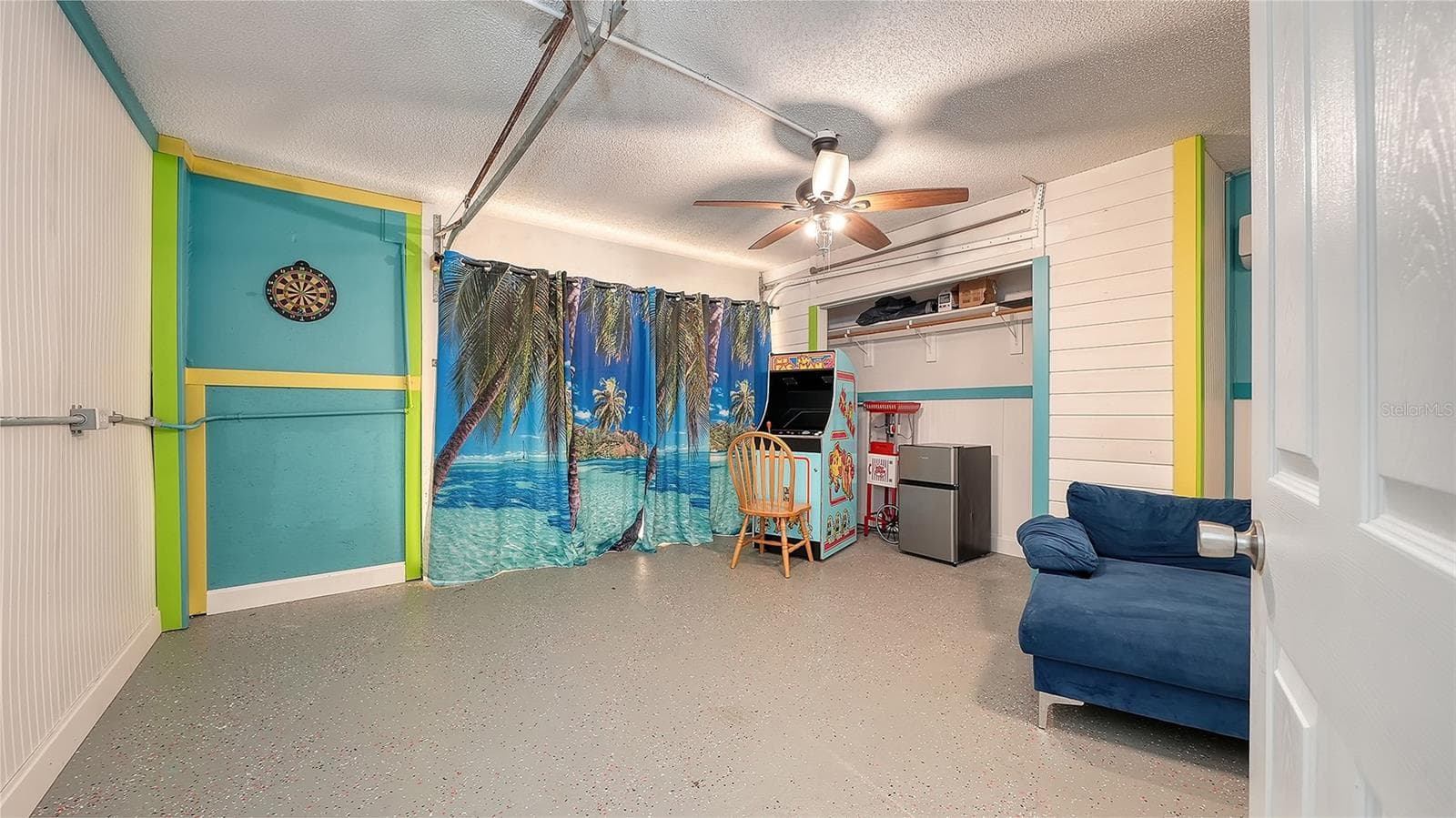 Ground floor under Unit B, converted garage to game or rec room/storage space. - 2514 AVENUE B, BRADENTON BEACH
